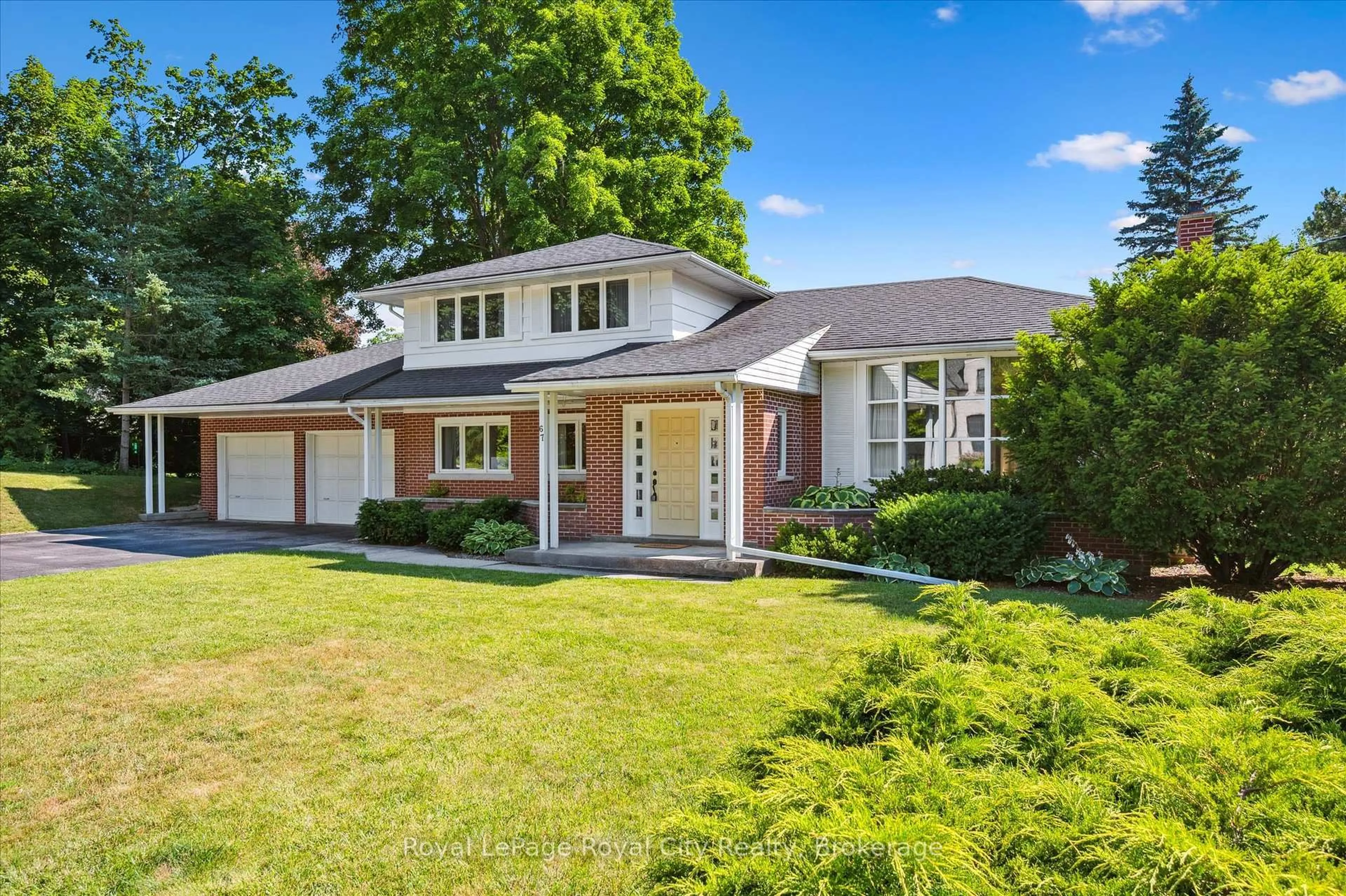 Home with brick exterior material, street for 67 Woodside Rd, Guelph Ontario N1G 2H1
