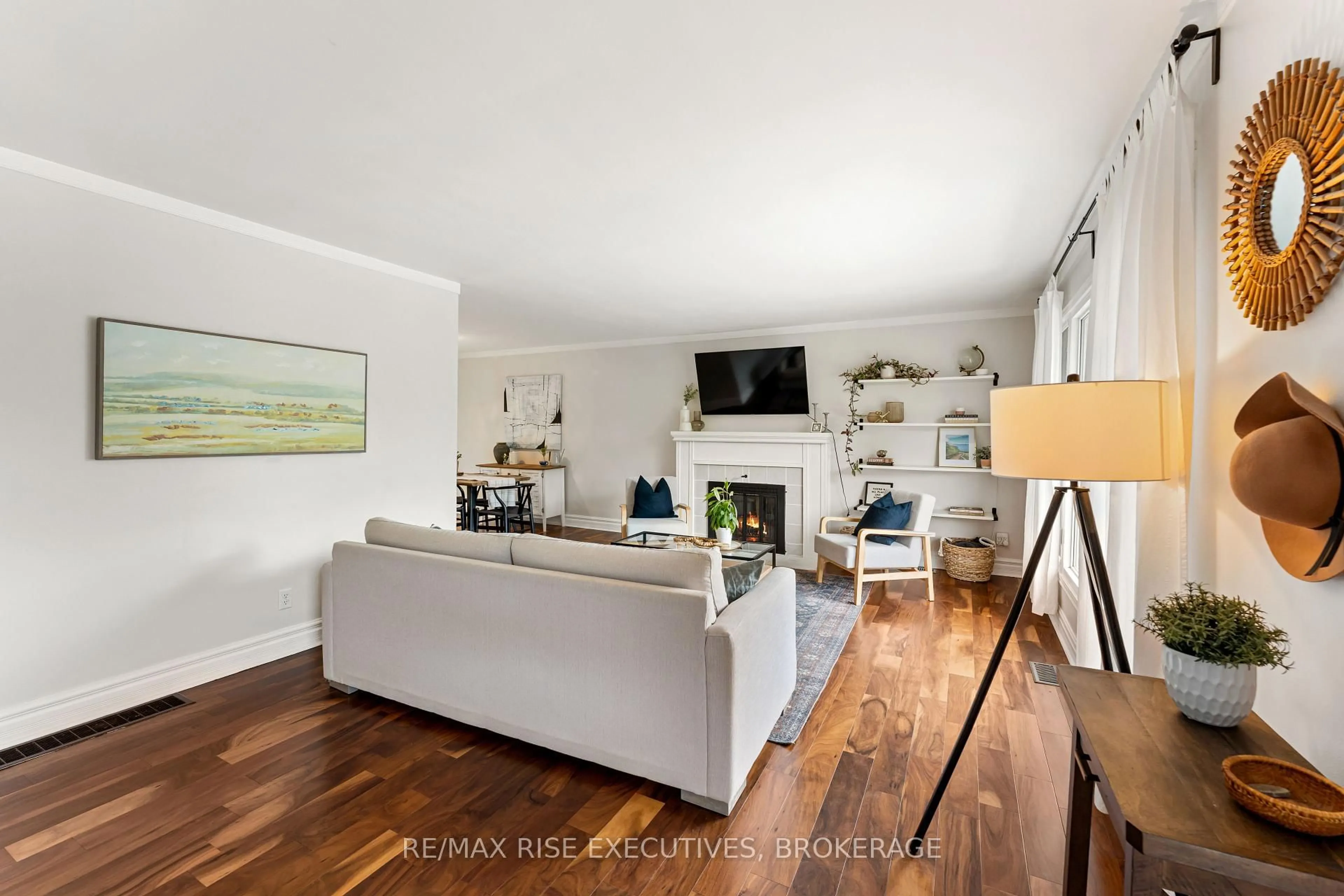 Living room with furniture, wood/laminate floor for 465 MacClement Dr, Kingston Ontario K7M 5N8