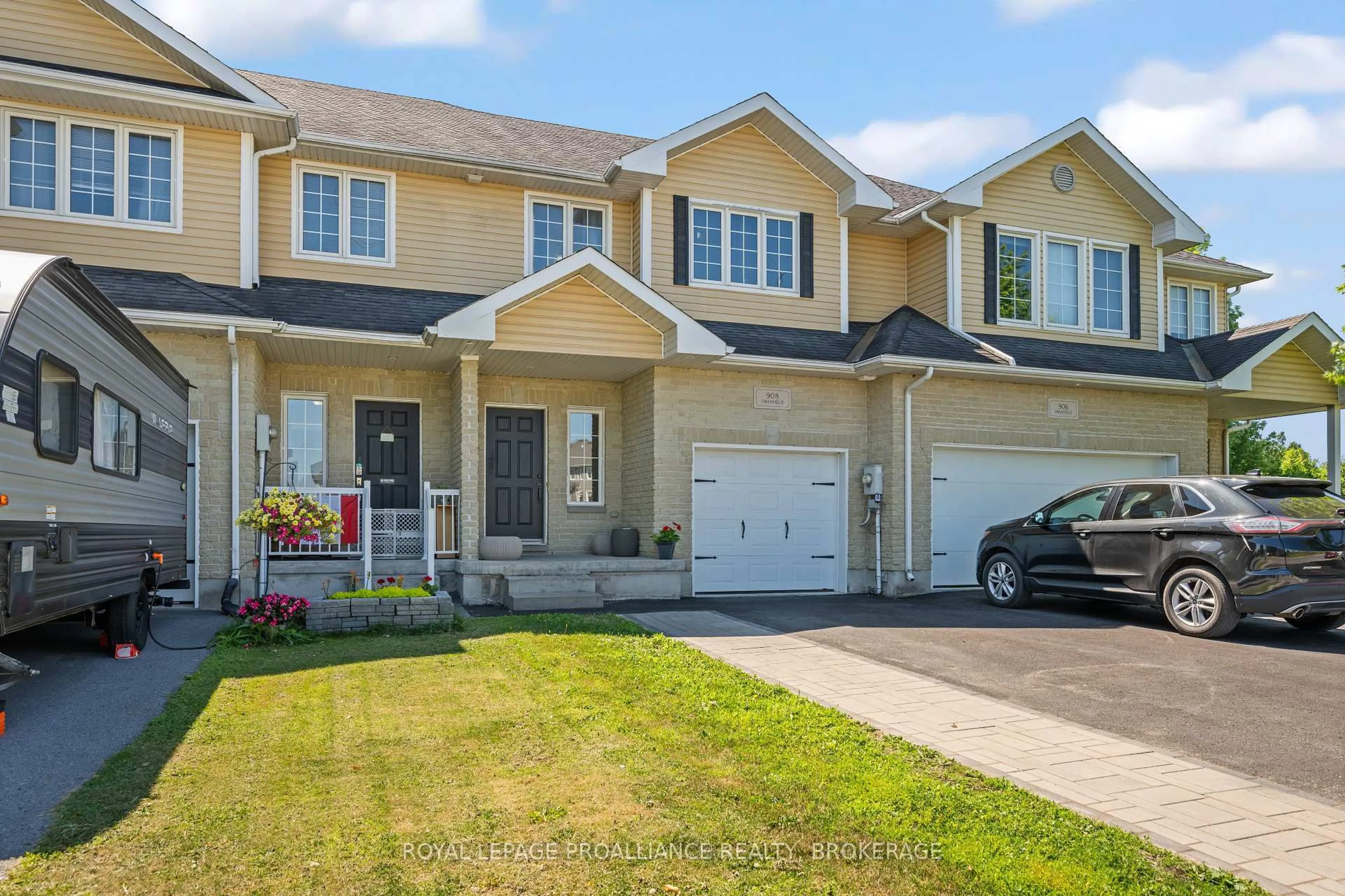 Home with vinyl exterior material, street for 908 Swanfield St, Kingston Ontario K7M 0A5
