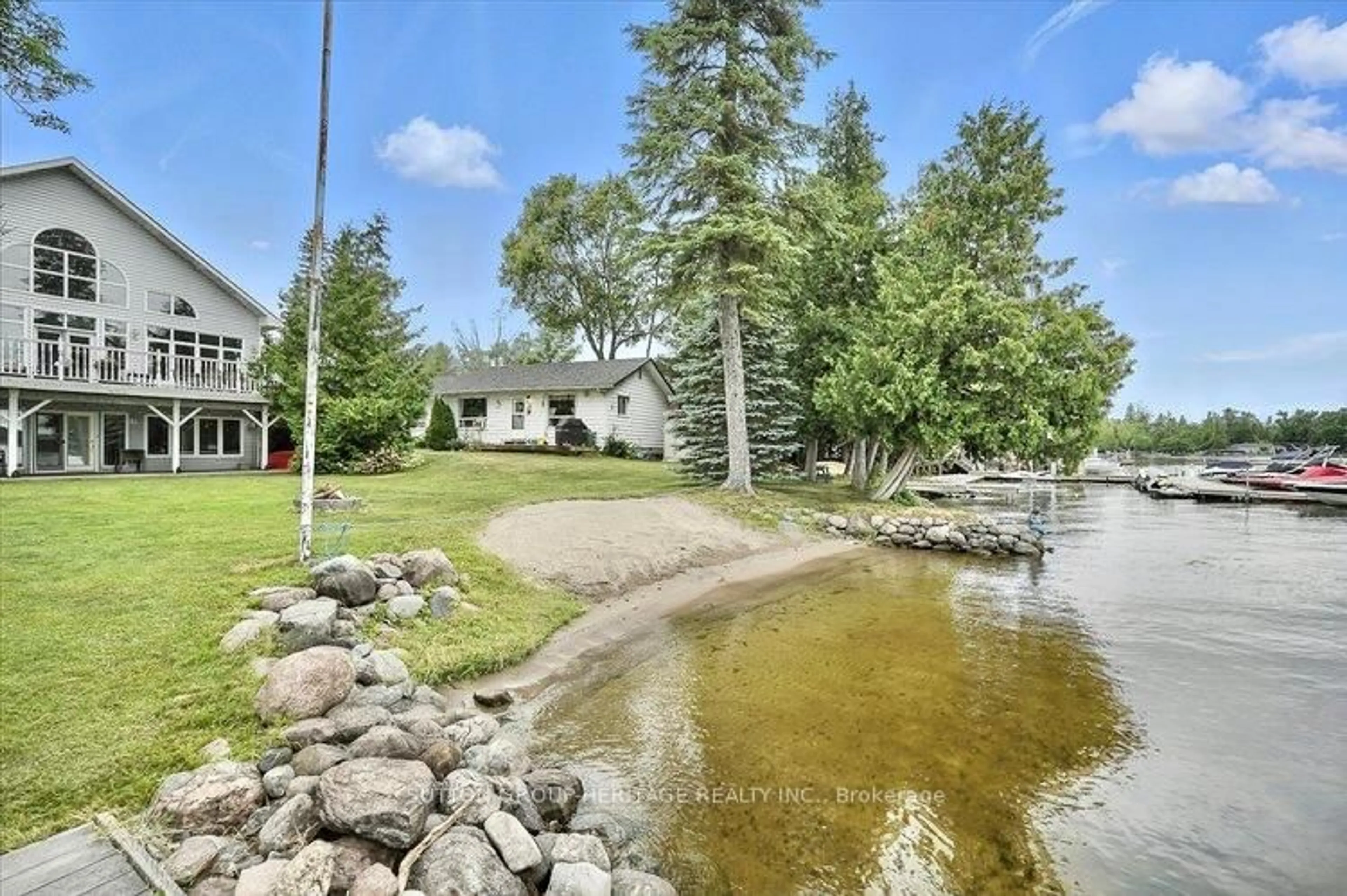 A pic from outside/outdoor area/front of a property/back of a property/a pic from drone, water/lake/river/ocean view for 400 Front St, Kawartha Lakes Ontario K0M 1A0