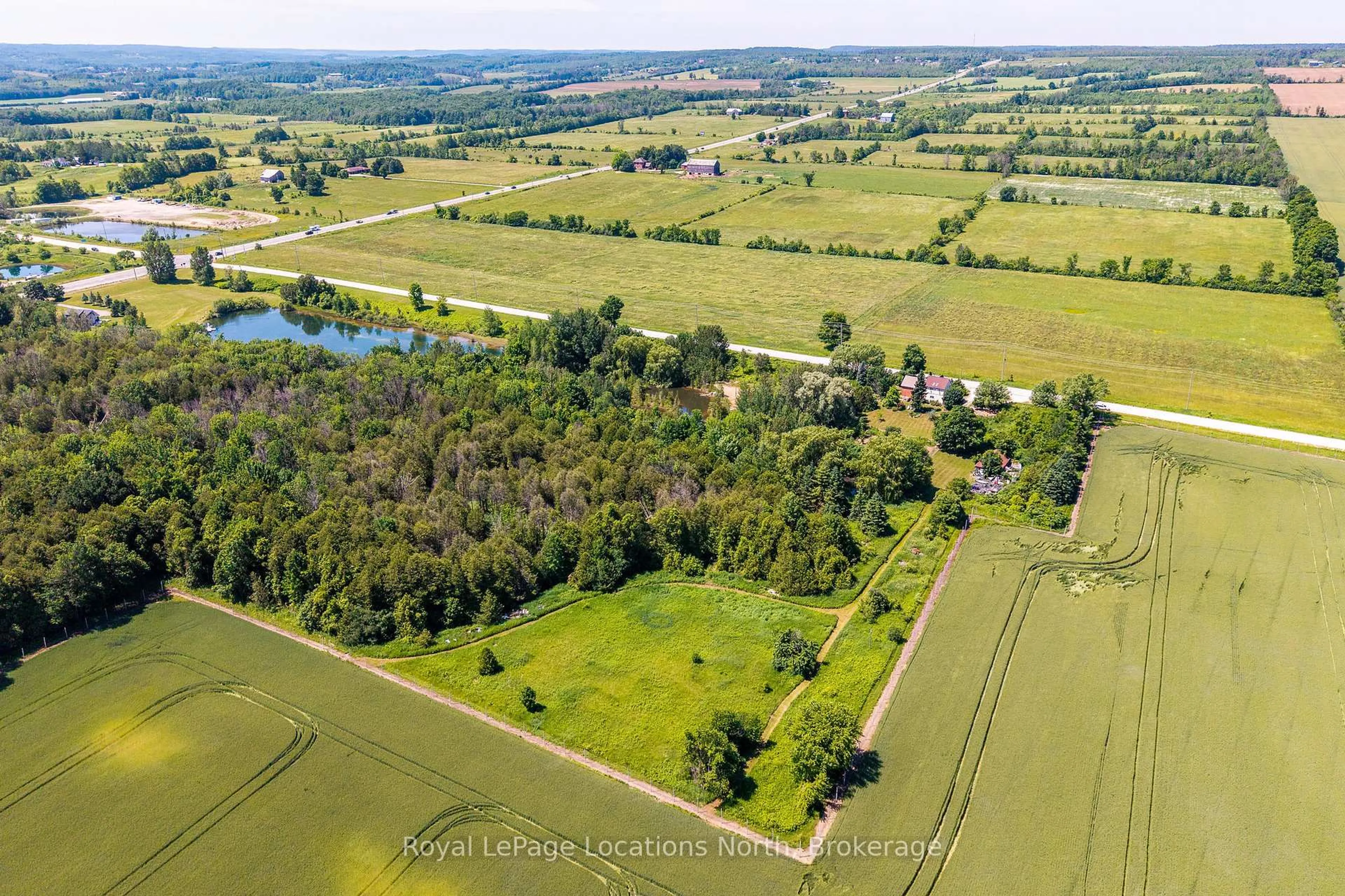 A pic from outside/outdoor area/front of a property/back of a property/a pic from drone, water/lake/river/ocean view for 138237 GREY ROAD 112 Rd, Meaford Ontario N4L 1W5