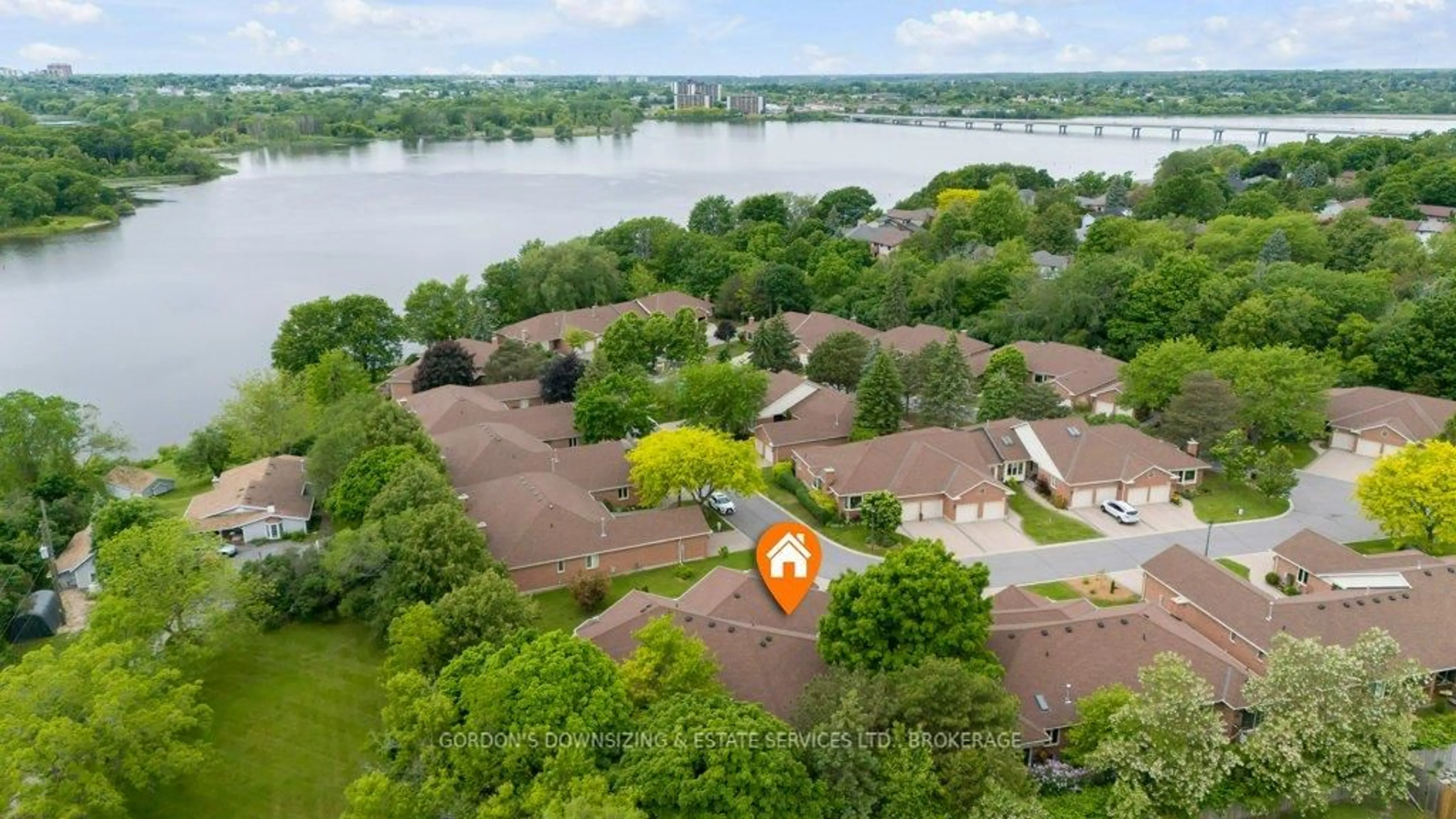 A pic from outside/outdoor area/front of a property/back of a property/a pic from drone, water/lake/river/ocean view for 100 Medley Crt #28, Kingston Ontario K7K 6X1