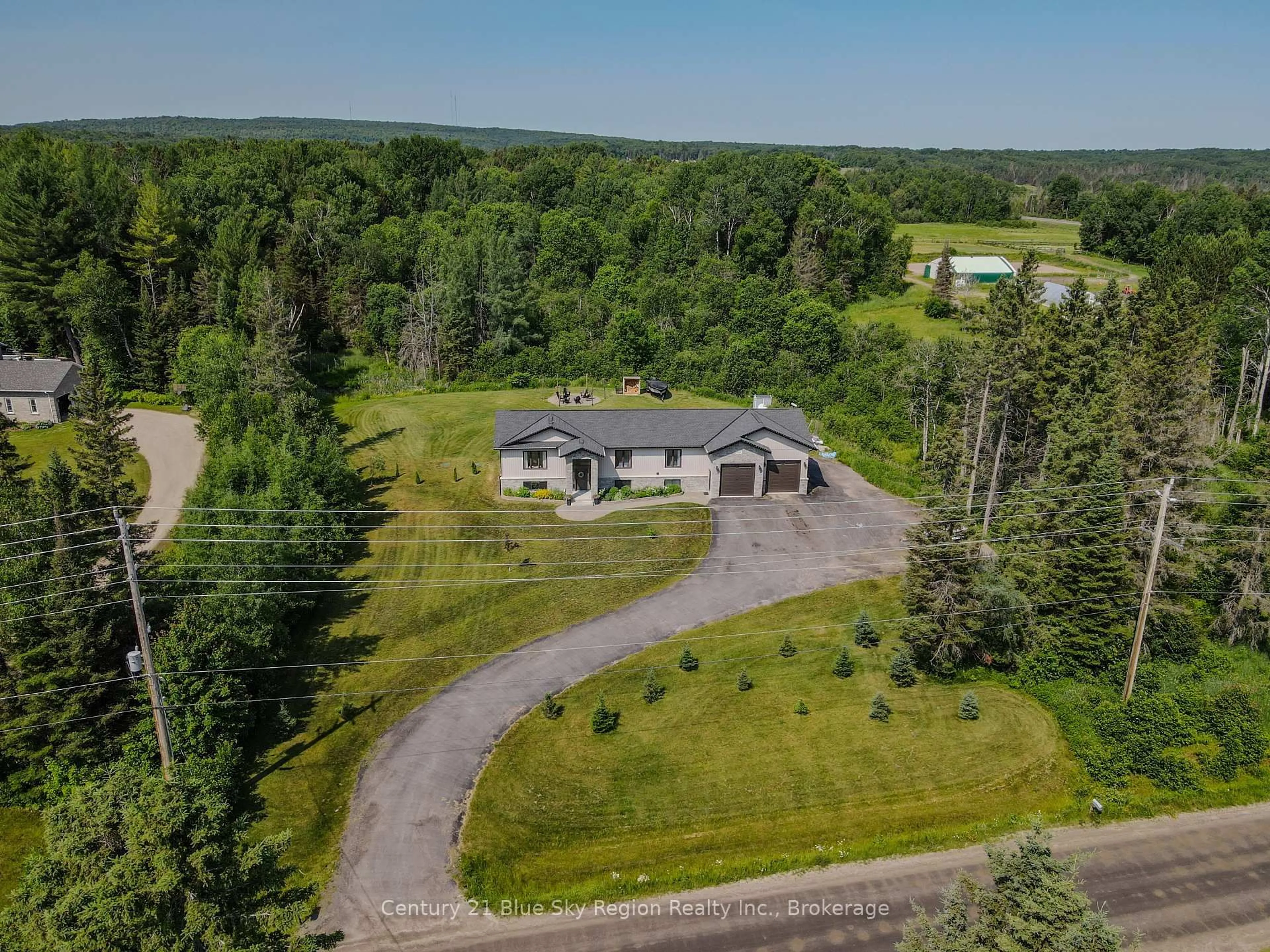 A pic from outside/outdoor area/front of a property/back of a property/a pic from drone, unknown for 1147 Maple Hill Rd, Powassan Ontario P0H 1Z0