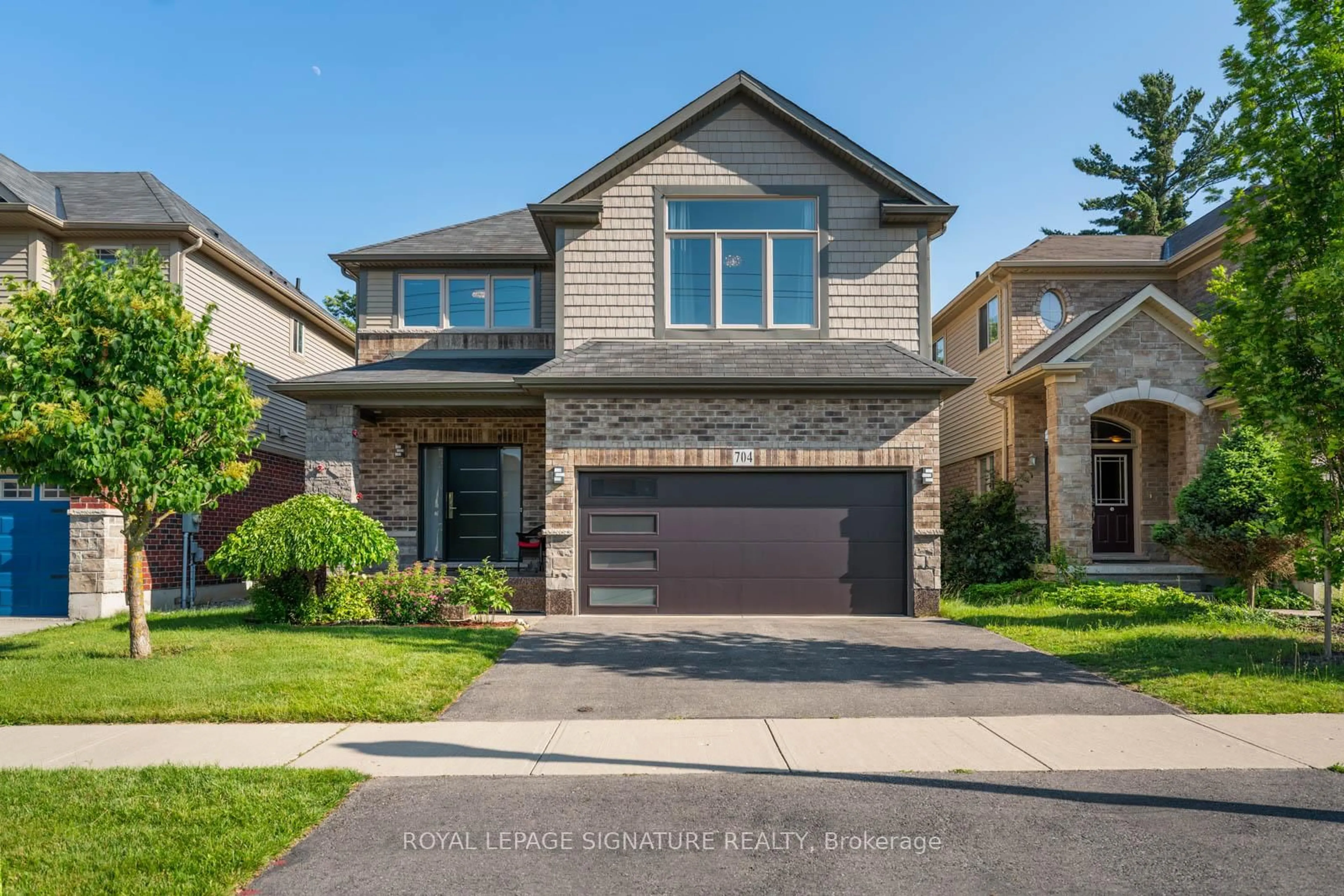 Home with brick exterior material, street for 704 Robert Ferrie Dr, Kitchener Ontario N2R 0B2
