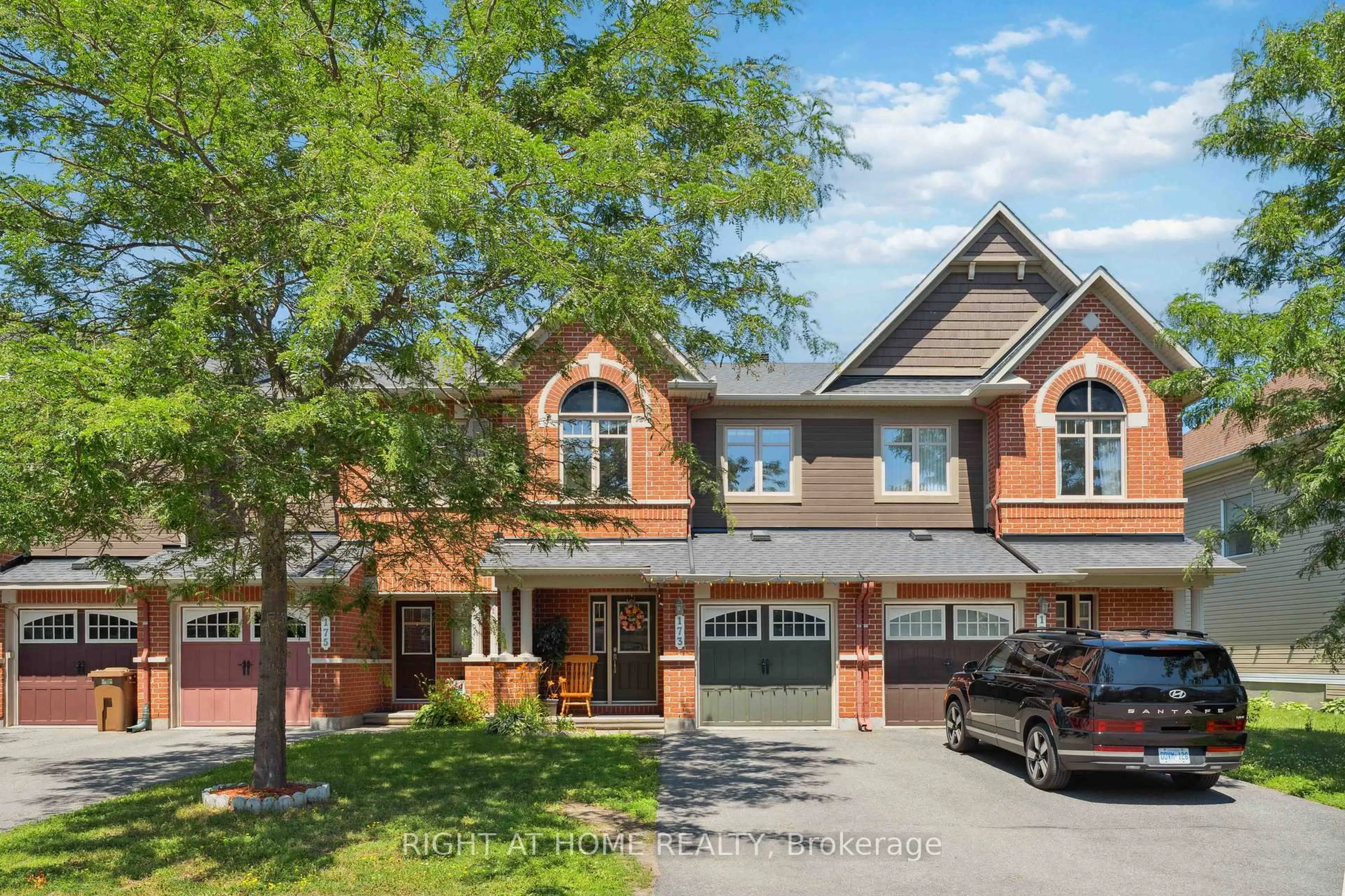 Home with brick exterior material, street for 173 Garrity Cres, Ottawa Ontario K2J 3T5