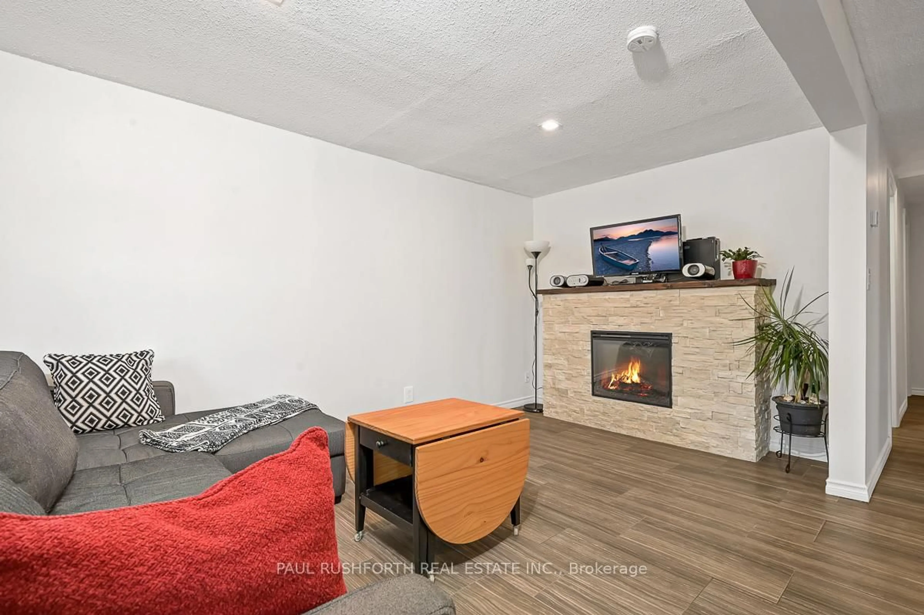 Living room with furniture, wood/laminate floor for 103 Ottawa St, The Nation Ontario K0A 2M0