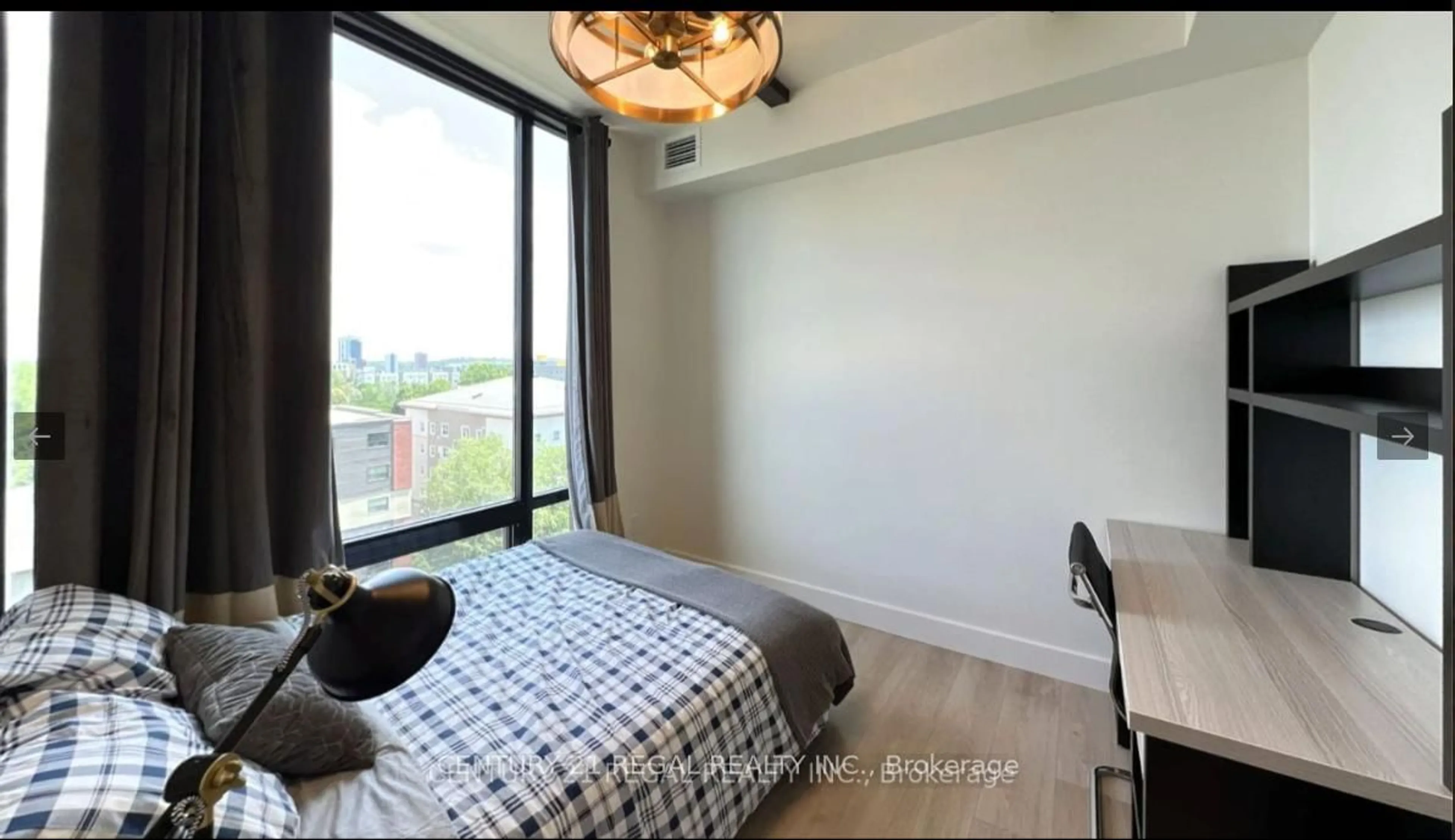 Bedroom with bed, wood/laminate floor for 145 COLUMBIA St #909, Waterloo Ontario N2L 0K7