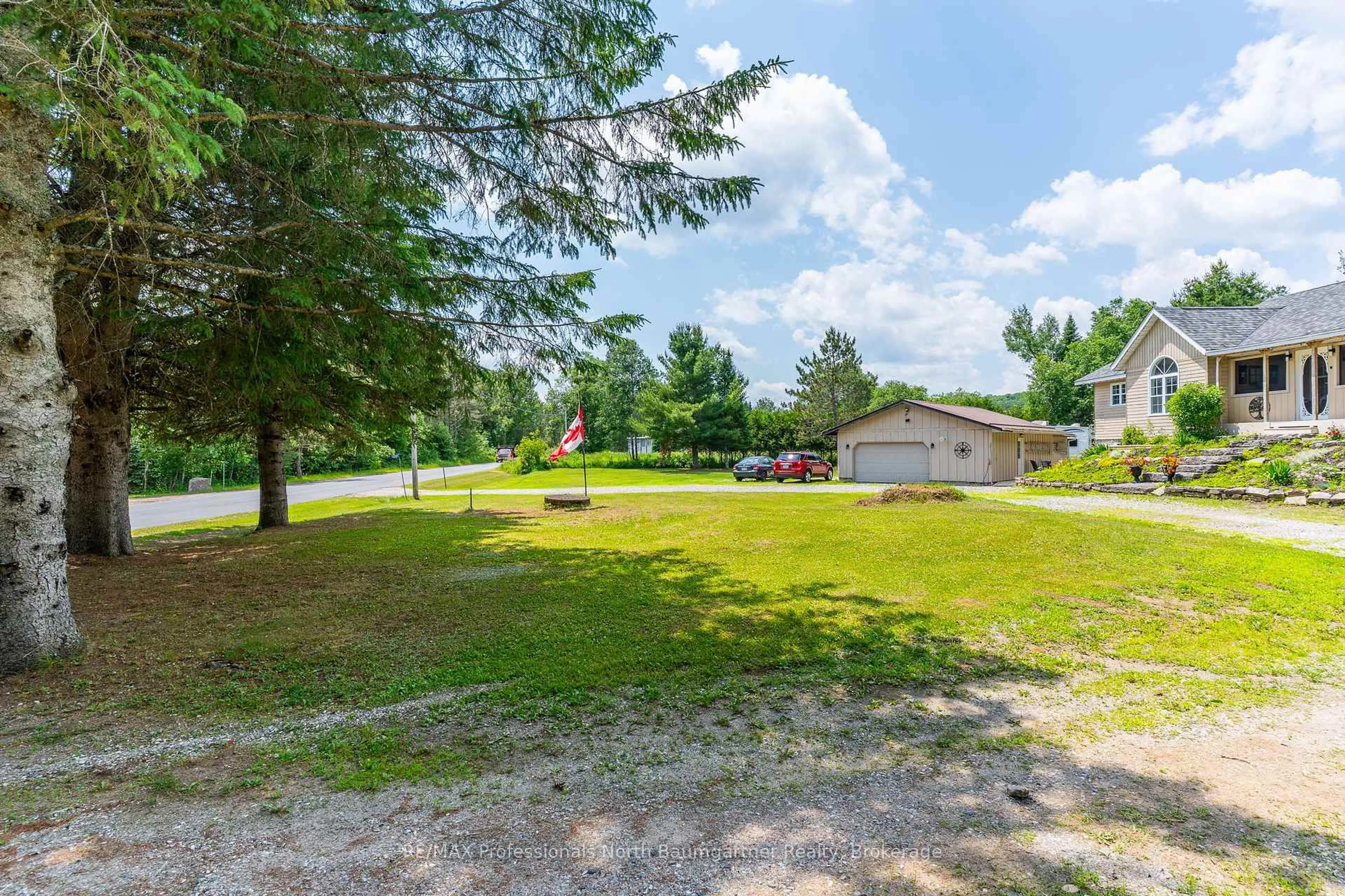 A pic from outside/outdoor area/front of a property/back of a property/a pic from drone, unknown for 1091 Koshlong Lake Rd, Dysart et al Ontario K0M 1S0