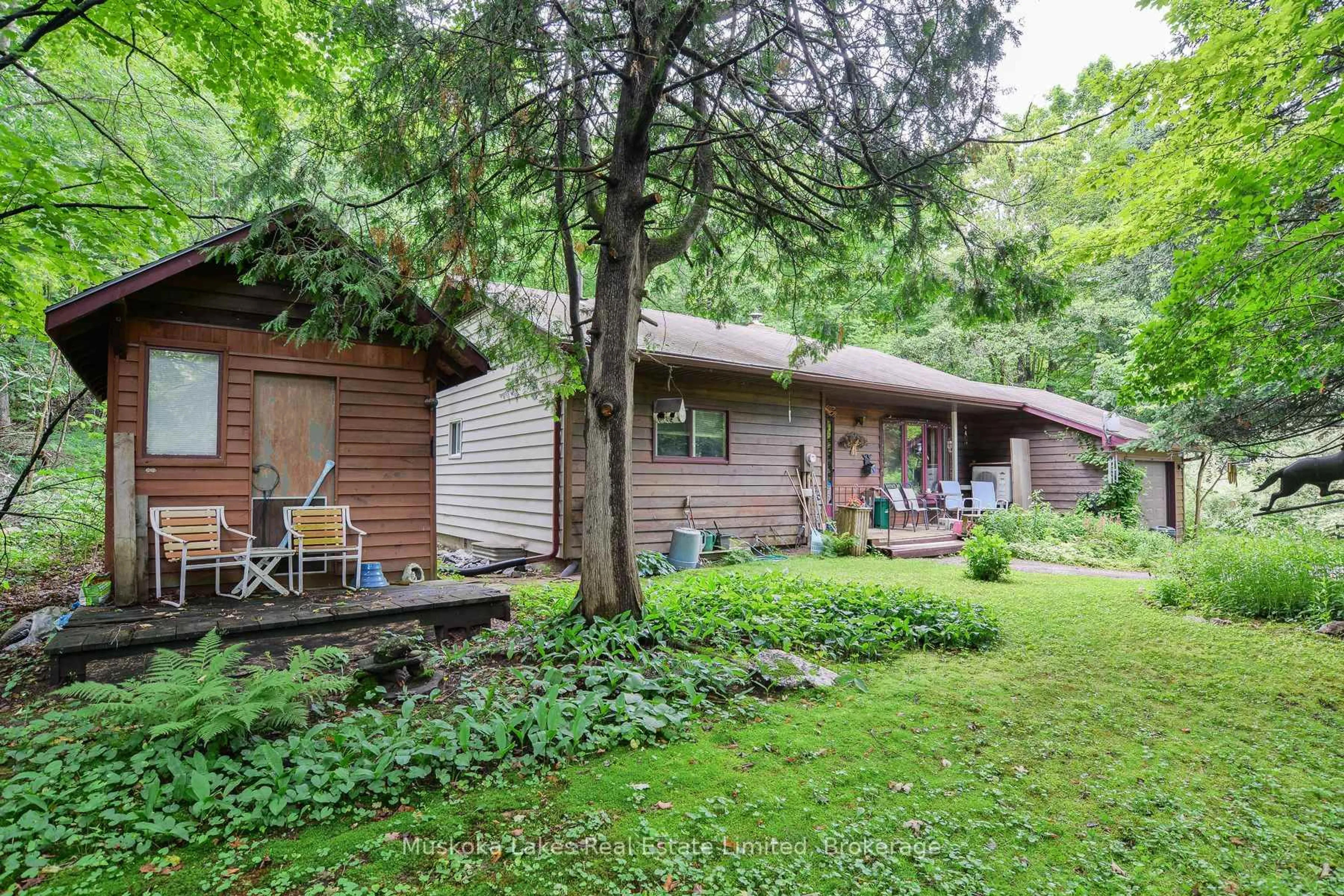 Patio, forest/trees view for 2065 Peninsula Rd, Muskoka Lakes Ontario P0B 1G0