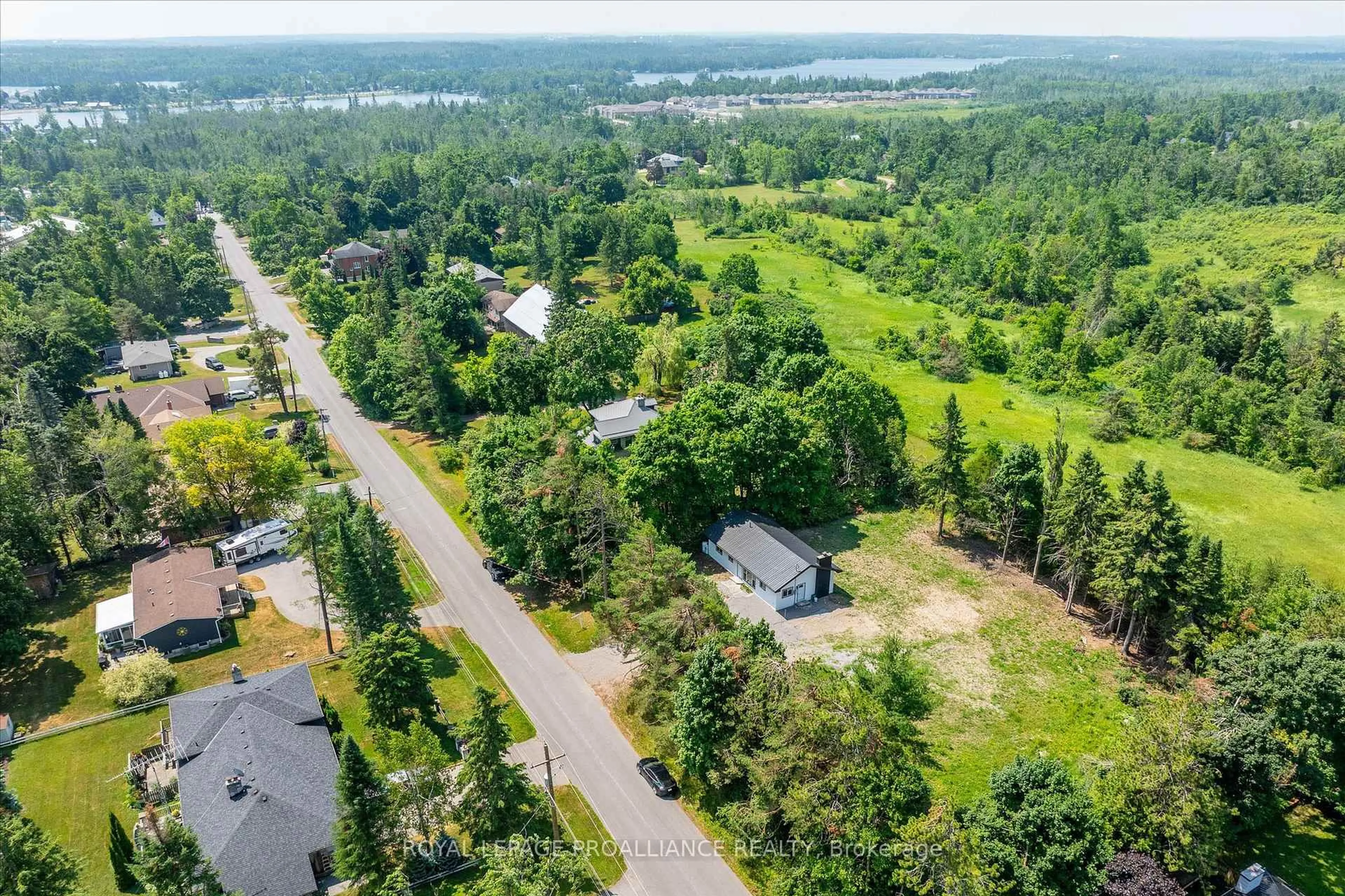 A pic from outside/outdoor area/front of a property/back of a property/a pic from drone, unknown for 100 Reid St, Kawartha Lakes Ontario K0M 1A0