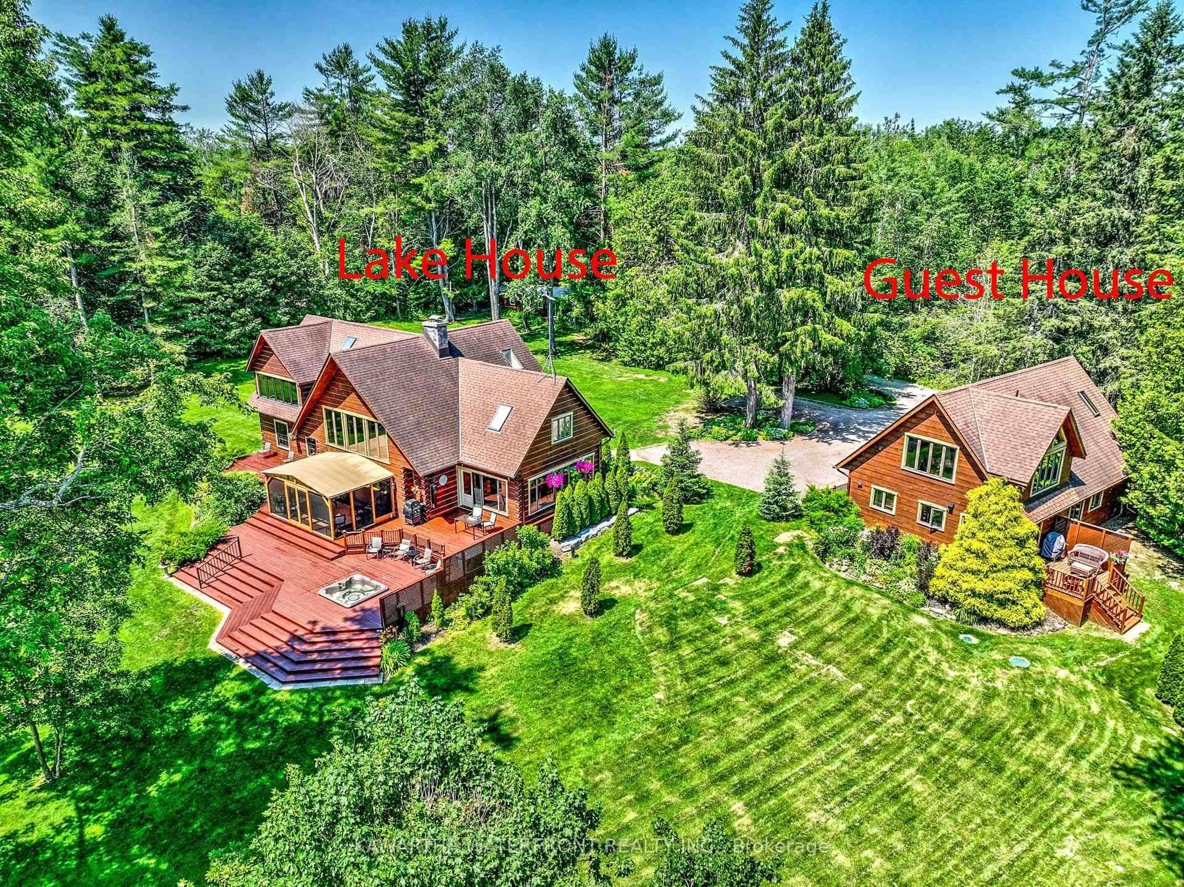 A pic from outside/outdoor area/front of a property/back of a property/a pic from drone, forest/trees view for 24 Courtland Rd, Kawartha Lakes Ontario K0M 1K0