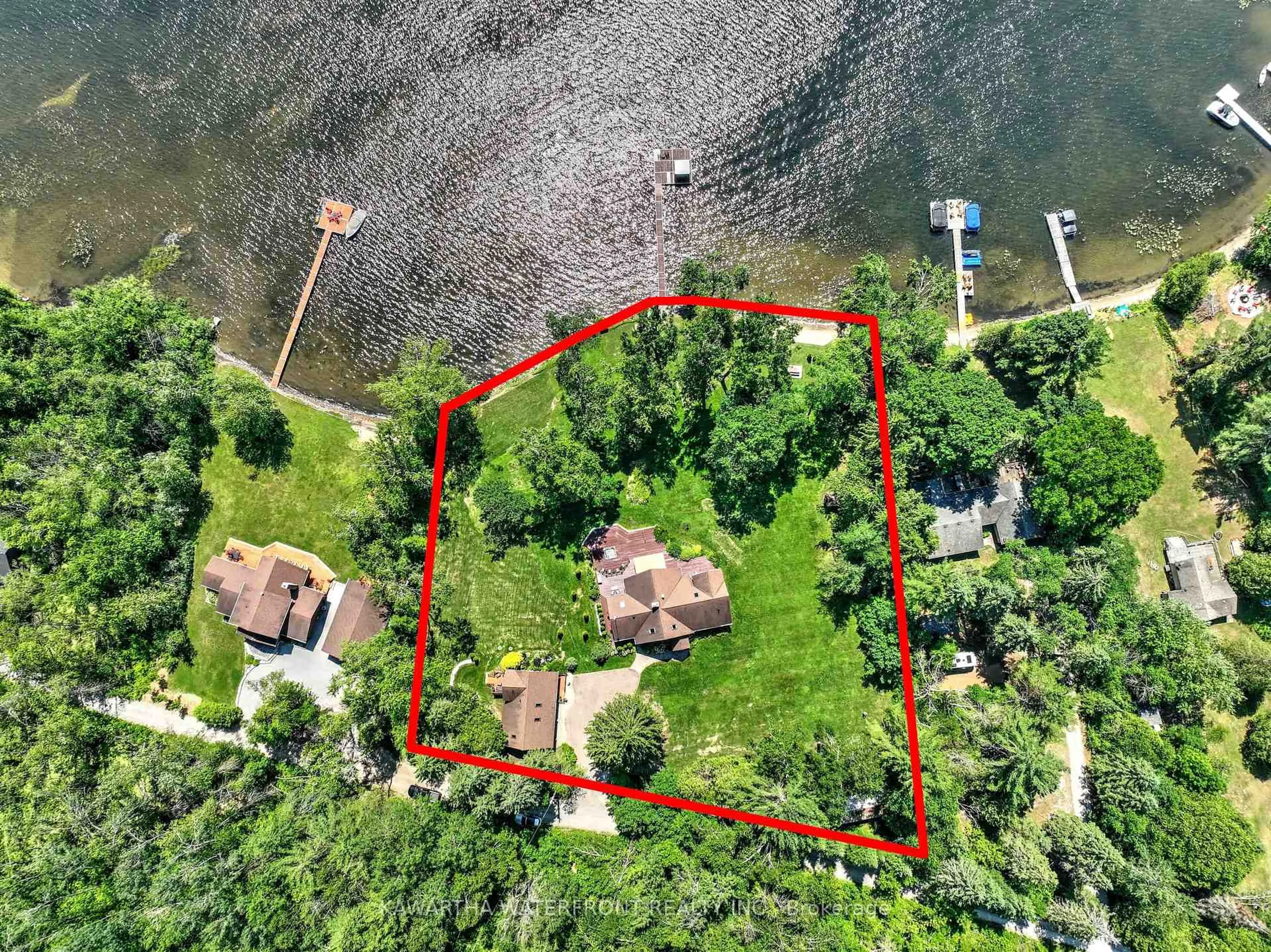A pic from outside/outdoor area/front of a property/back of a property/a pic from drone, water/lake/river/ocean view for 24 Courtland Rd, Kawartha Lakes Ontario K0M 1K0