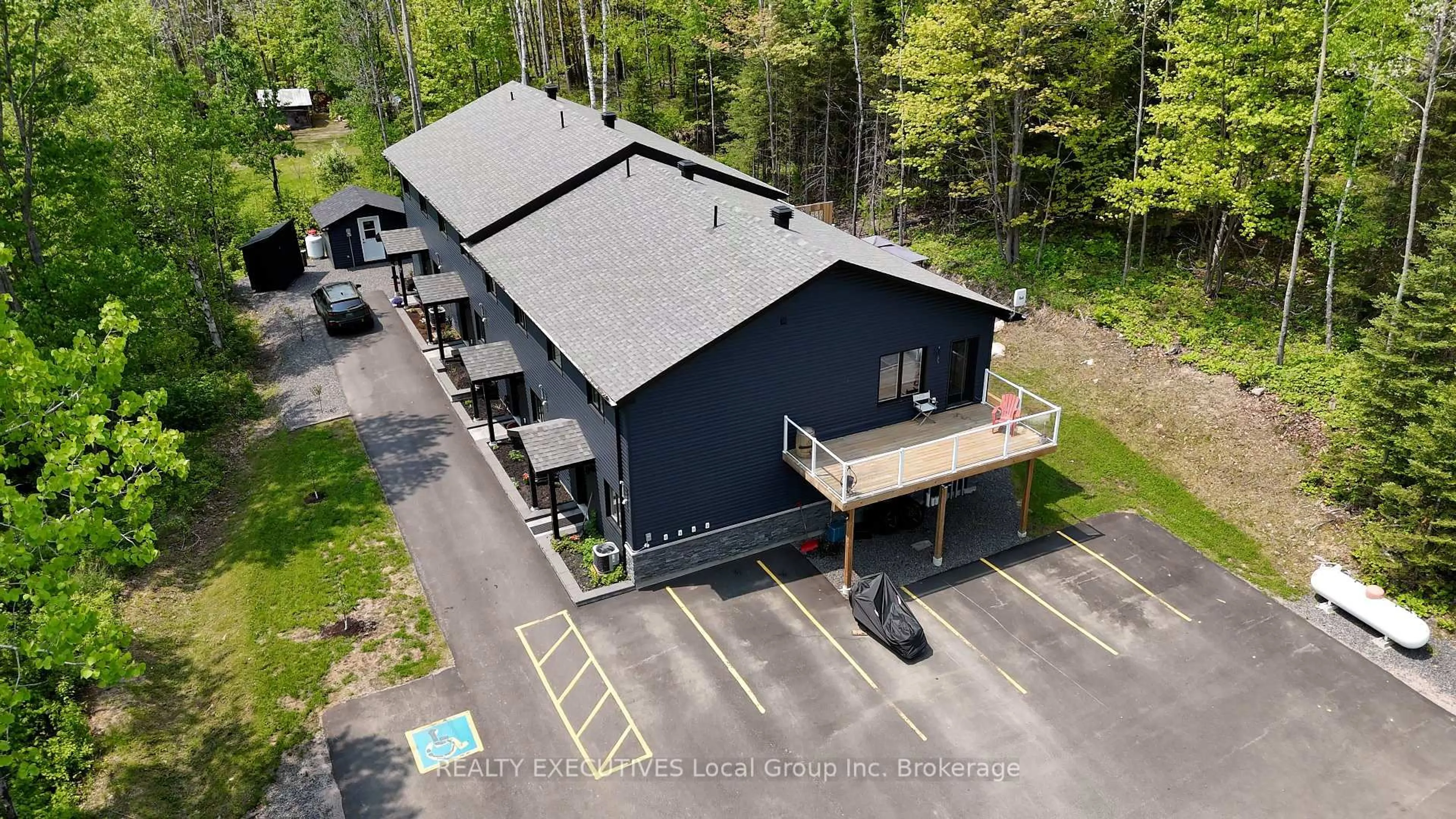 A pic from outside/outdoor area/front of a property/back of a property/a pic from drone, building for 1278 VILLAGE Rd #4, East Ferris Ontario P0H 1B0