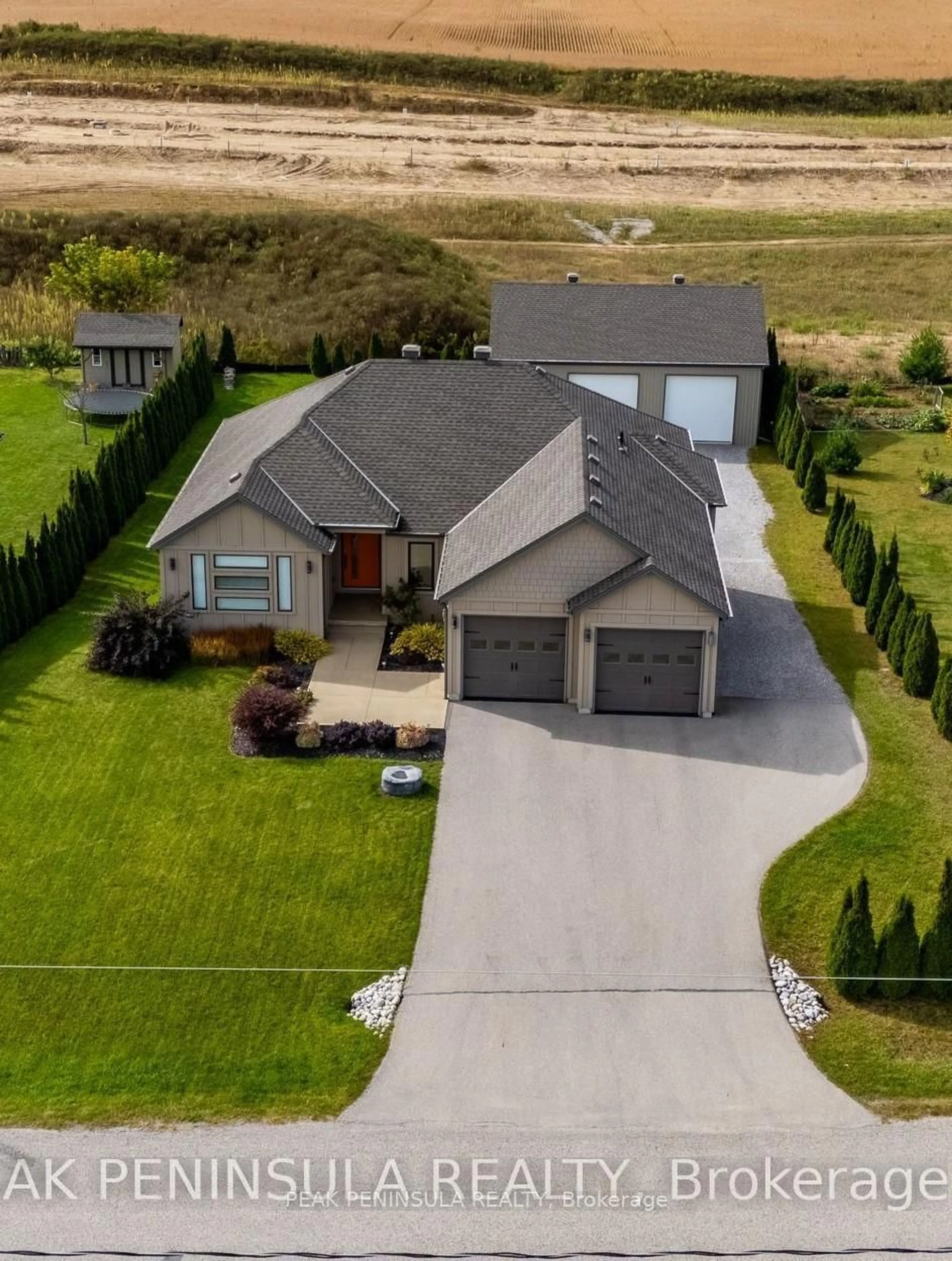 A pic from outside/outdoor area/front of a property/back of a property/a pic from drone, street for 8383 Sandytown Rd, Bayham Ontario N0J 1Y0