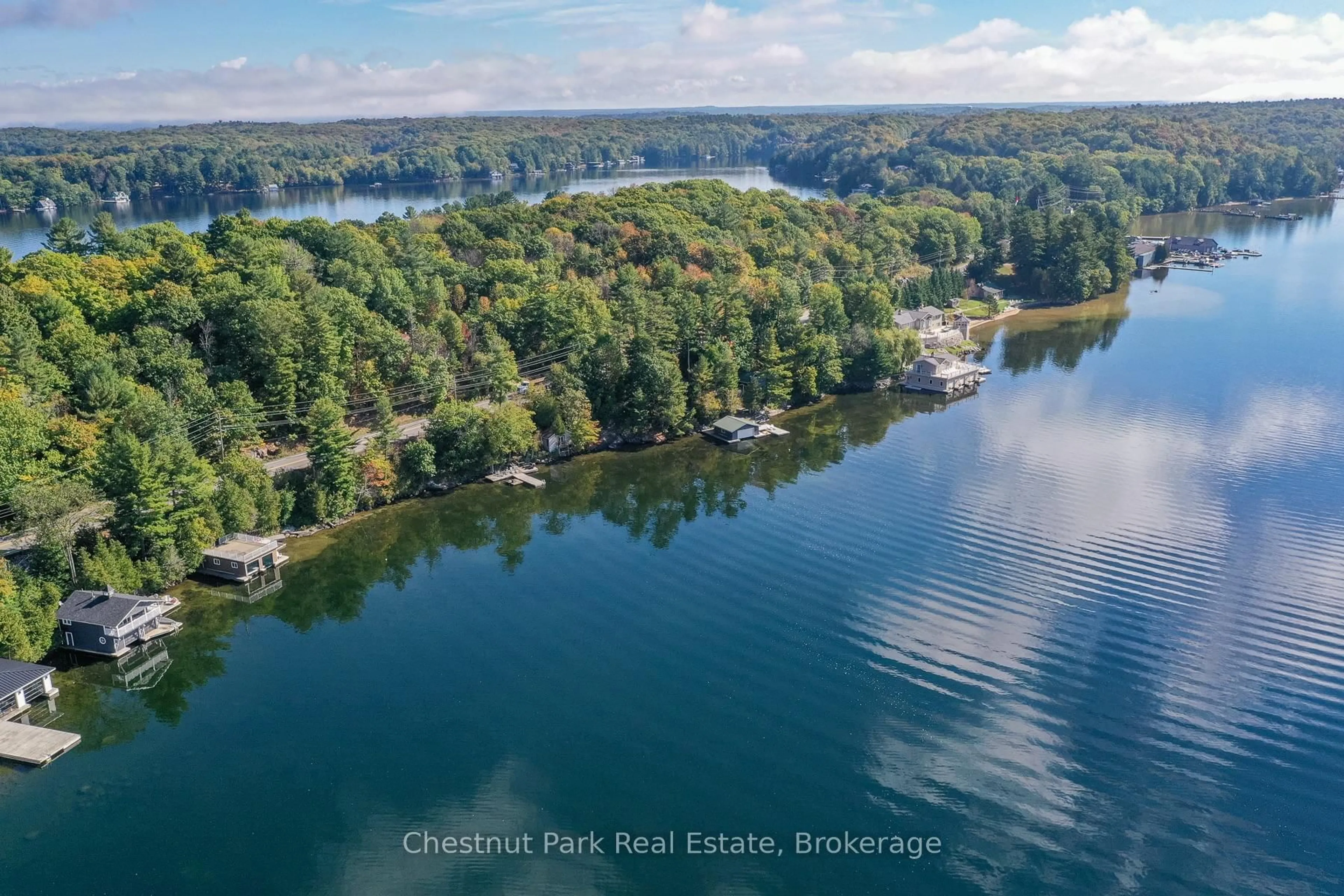 A pic from outside/outdoor area/front of a property/back of a property/a pic from drone, water/lake/river/ocean view for 1375 Peninsula Rd, Muskoka Lakes Ontario P0B 1J0