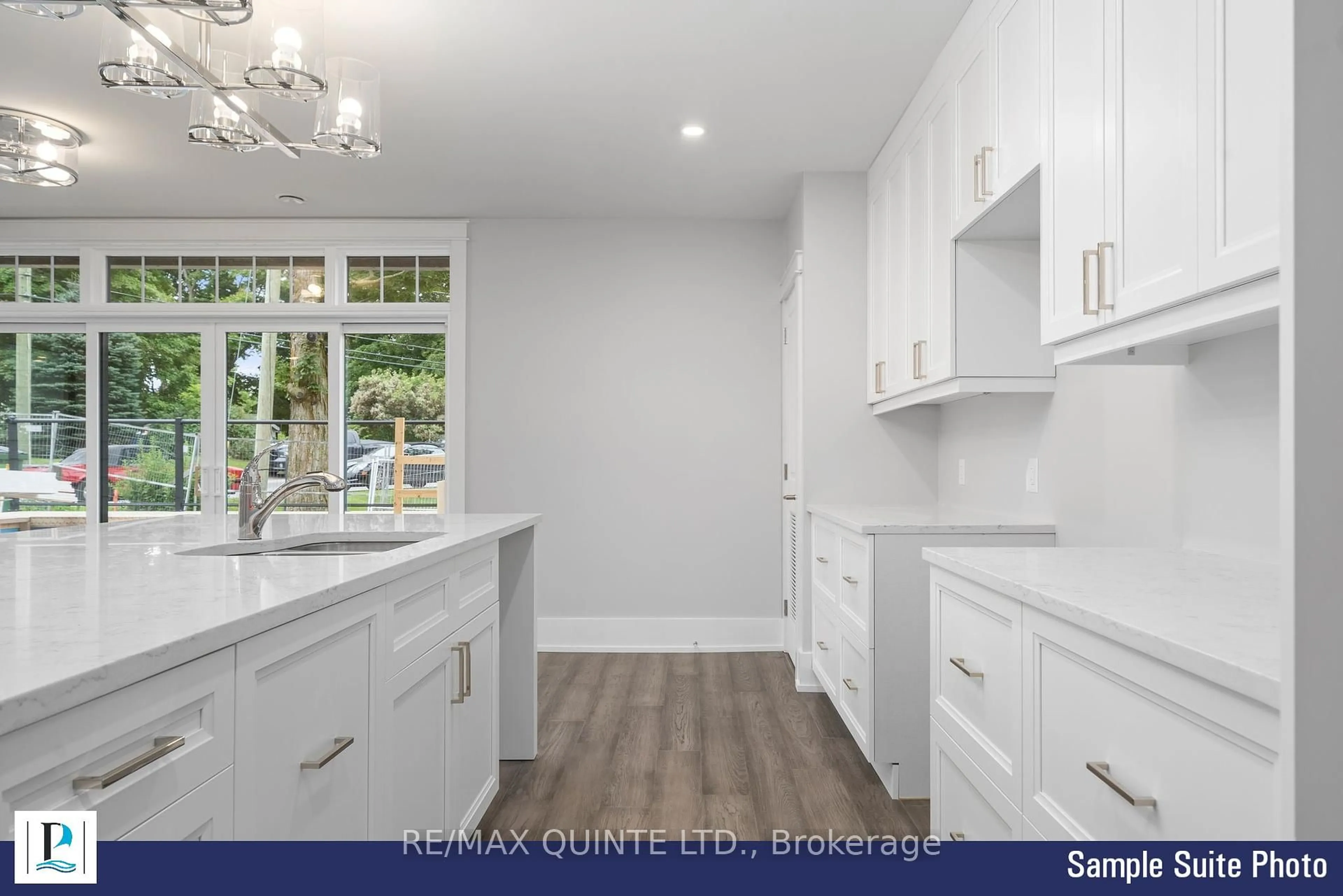 Open concept kitchen, ceramic/tile floor for 12 Clara Dr #101, Prince Edward County Ontario K0K 2T0