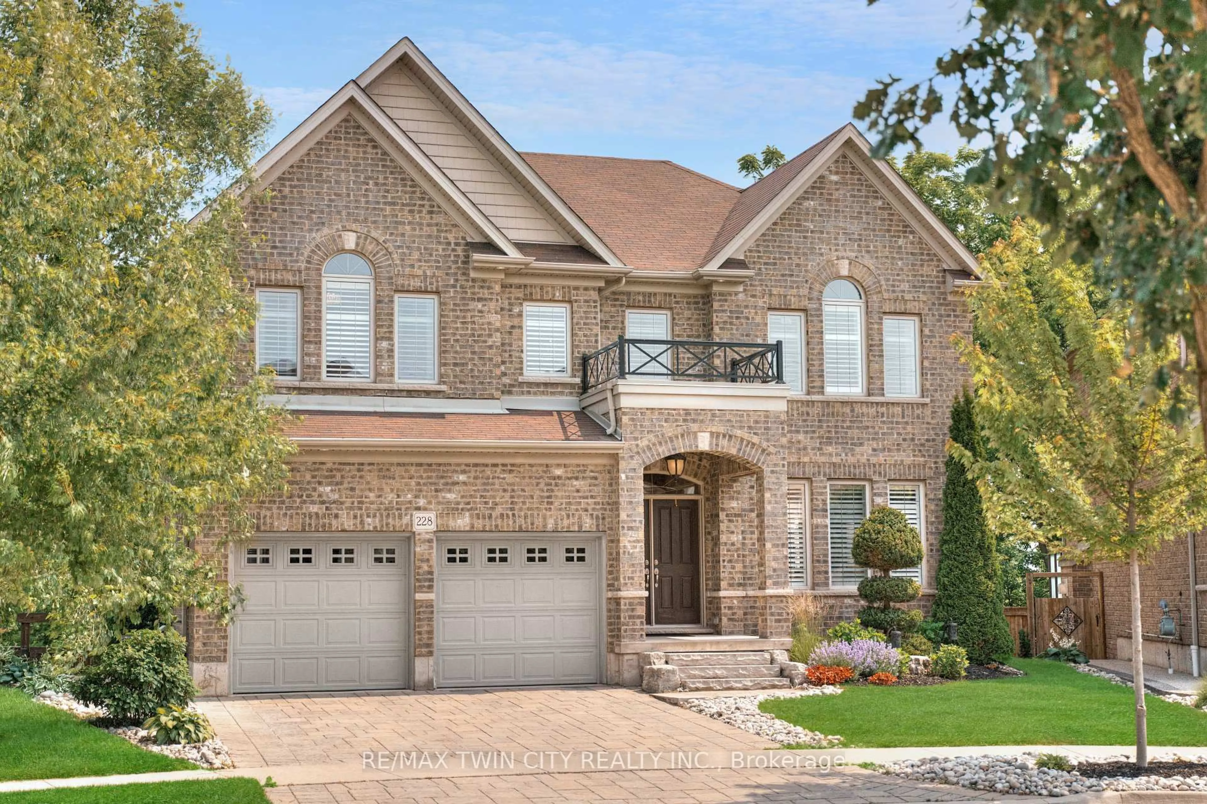 Home with brick exterior material, street for 228 Evens Pond Cres, Kitchener Ontario N2R 0B7
