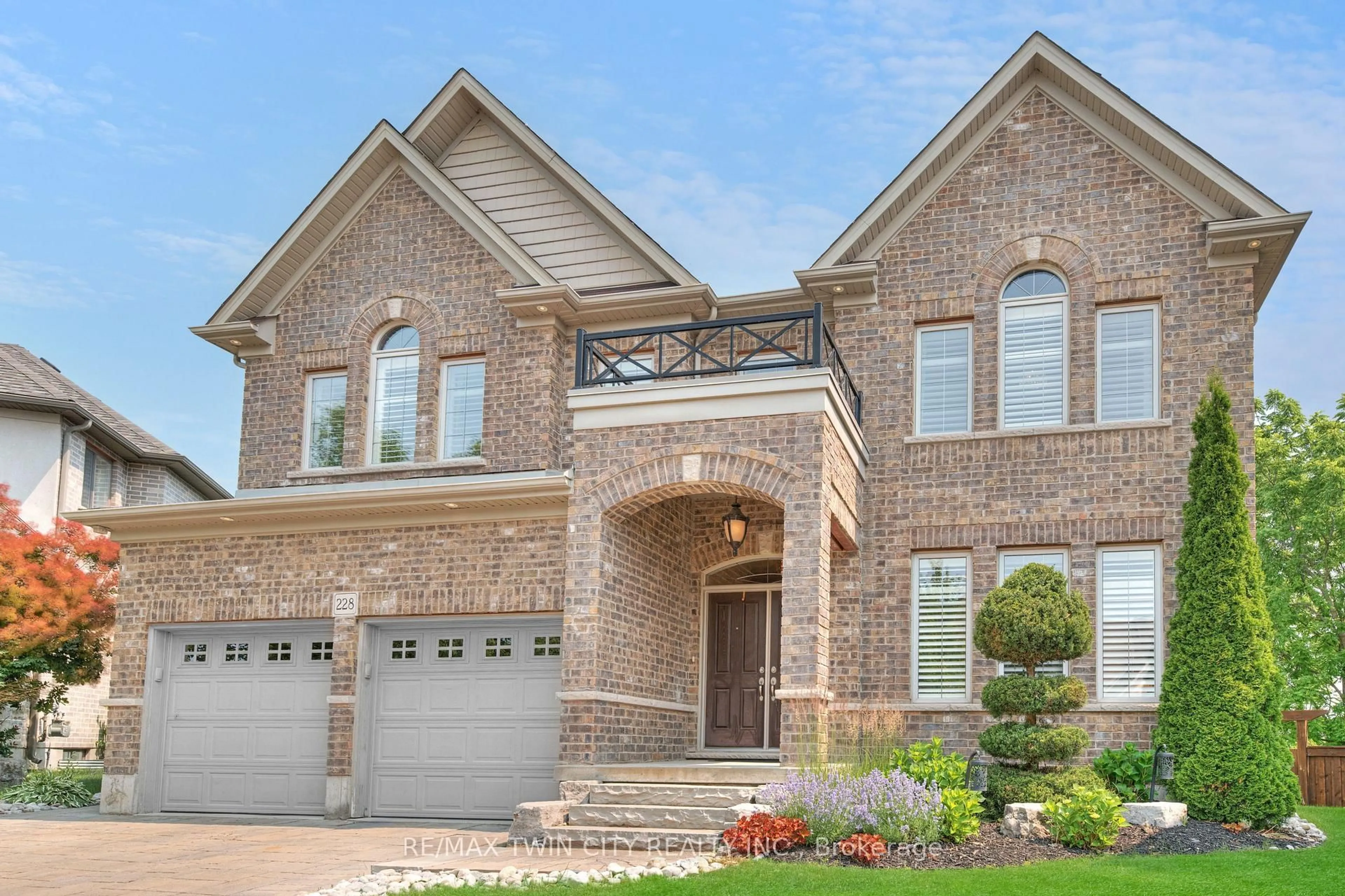 Home with brick exterior material, street for 228 Evens Pond Cres, Kitchener Ontario N2R 0B7