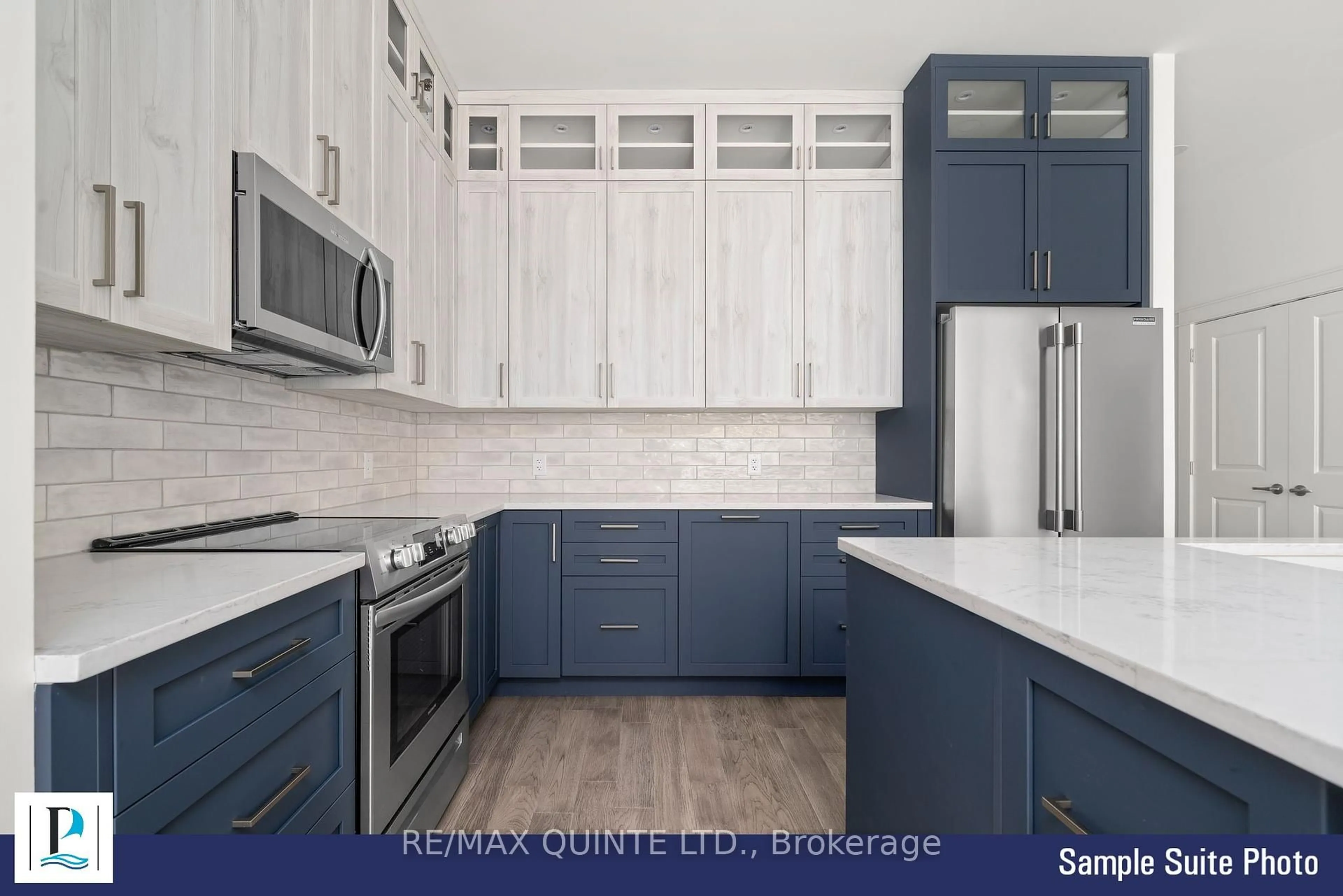 Open concept kitchen, ceramic/tile floor for 12 Clara Dr #105, Prince Edward County Ontario K0K 2T0