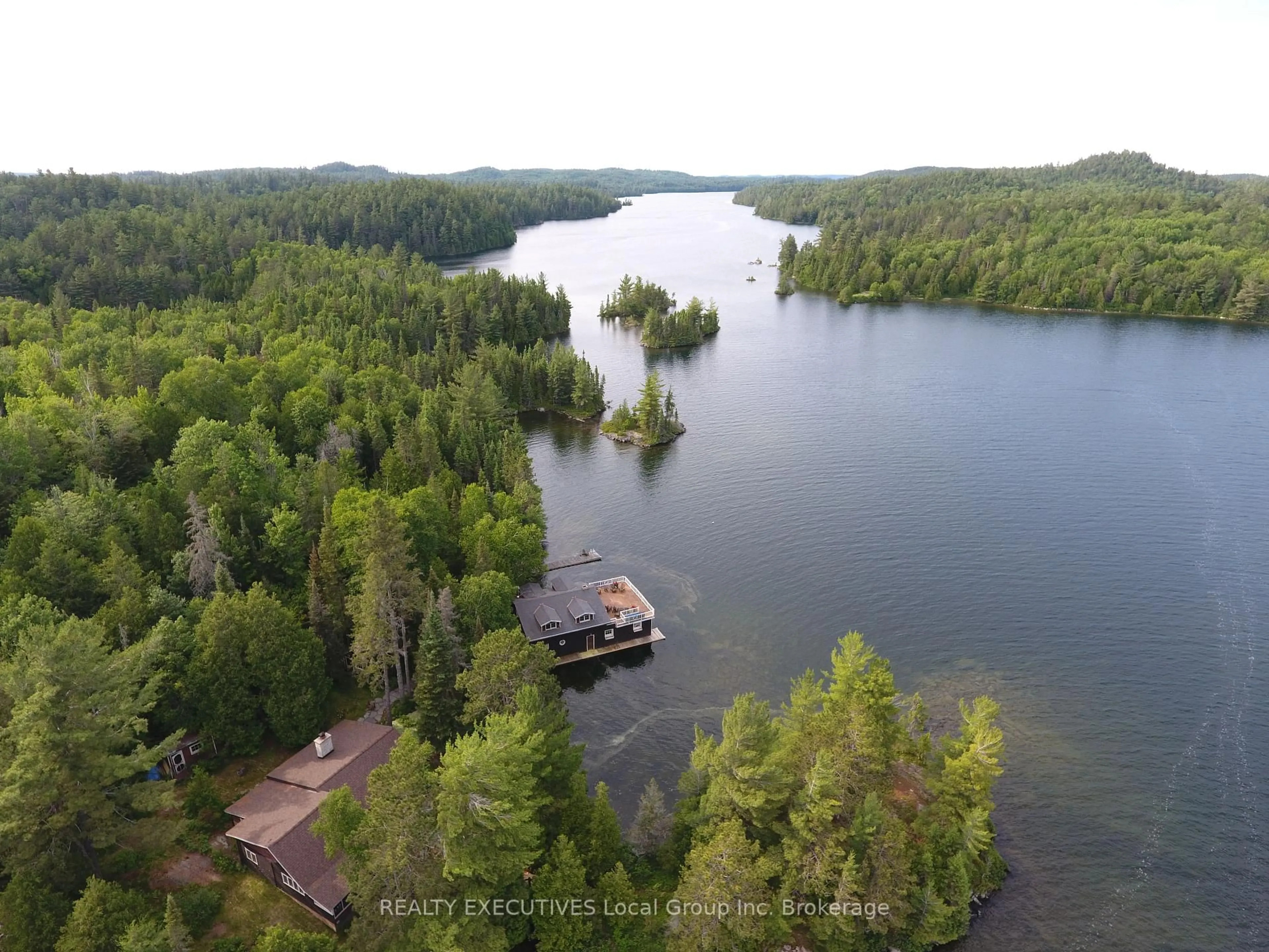 A pic from outside/outdoor area/front of a property/back of a property/a pic from drone, water/lake/river/ocean view for 1,2,3 Island 1058 Island, Temagami Ontario P0H 2H0