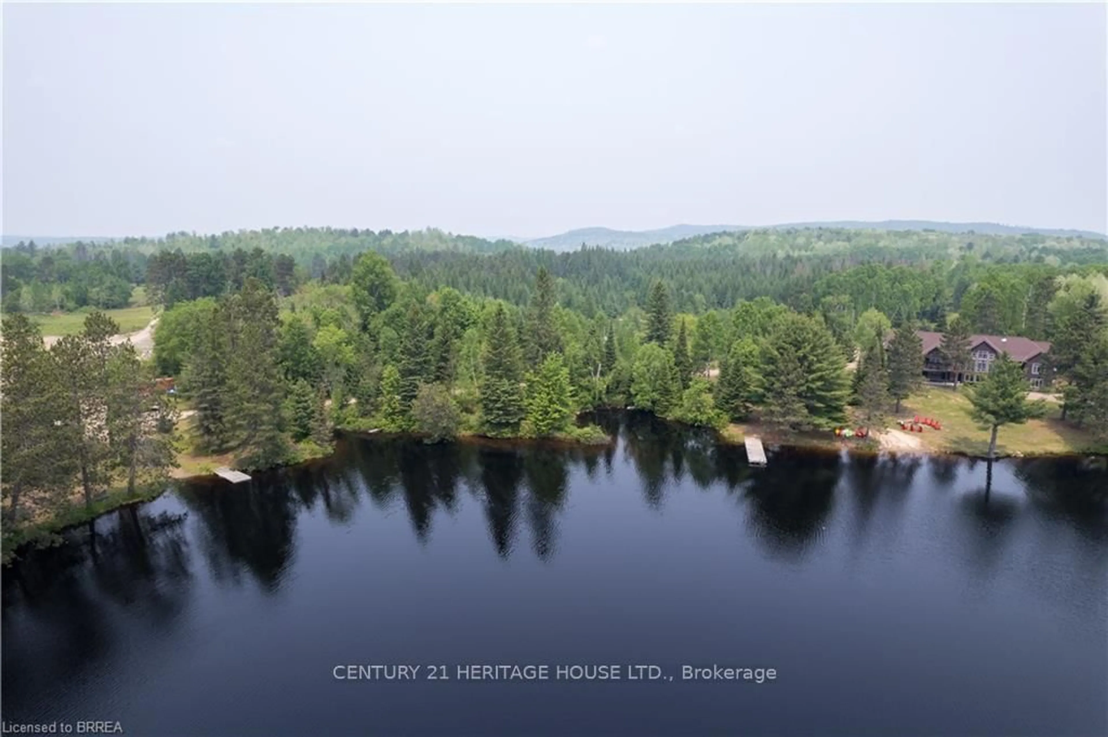 A pic from outside/outdoor area/front of a property/back of a property/a pic from drone, water/lake/river/ocean view for 6605 Highway 523, South Algonquin Ontario K0J 2C0