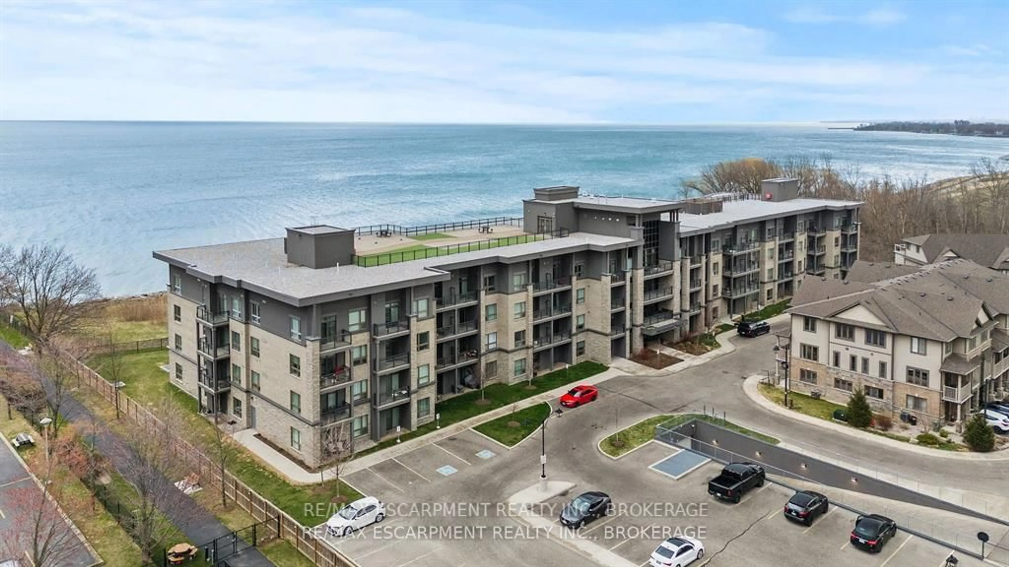 A pic from outside/outdoor area/front of a property/back of a property/a pic from drone, water/lake/river/ocean view for 35 Southshore Cres #230, Hamilton Ontario L8E 0J2