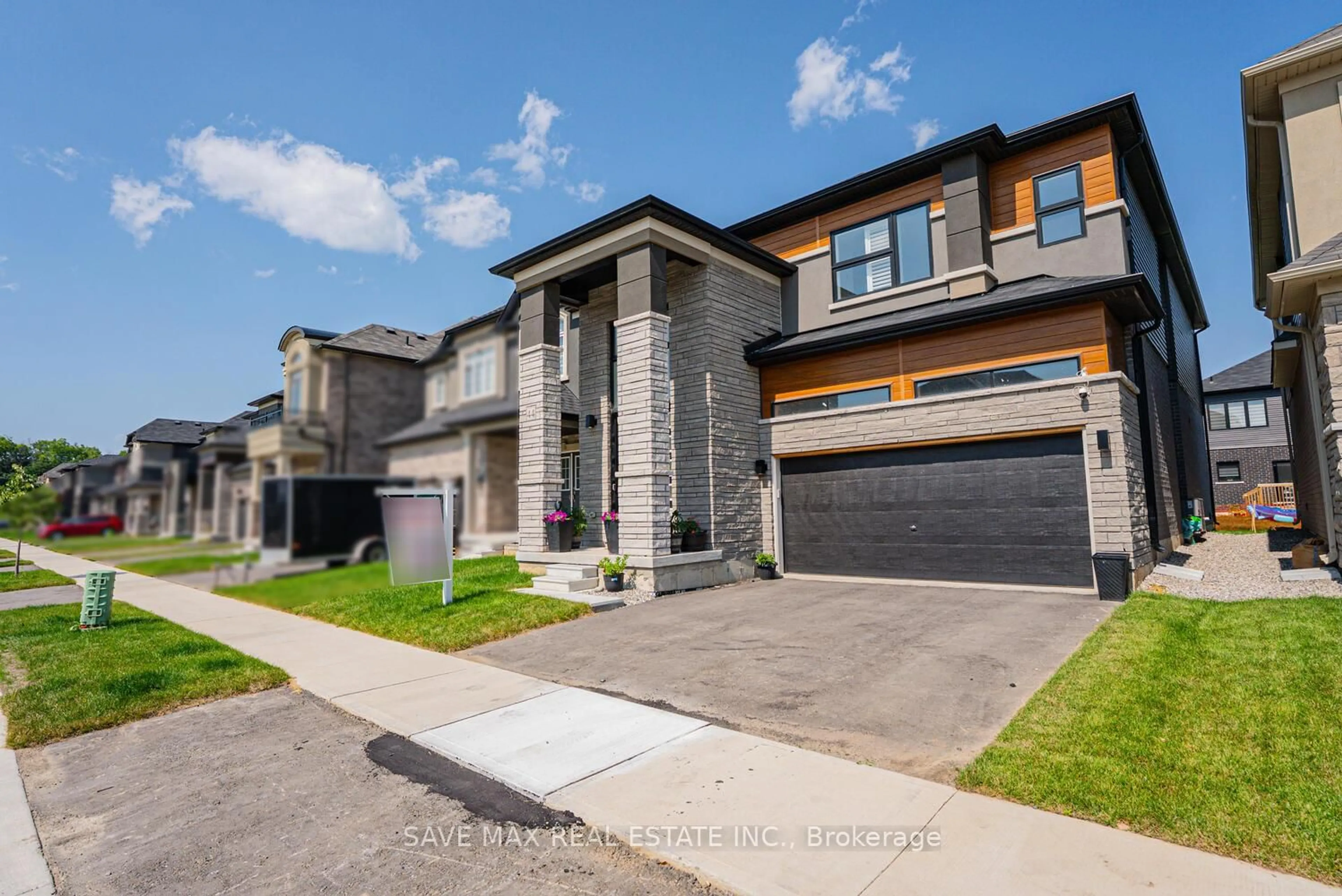 Home with brick exterior material, street for 44 Wakeling Dr, Brantford Ontario N3V 0B5