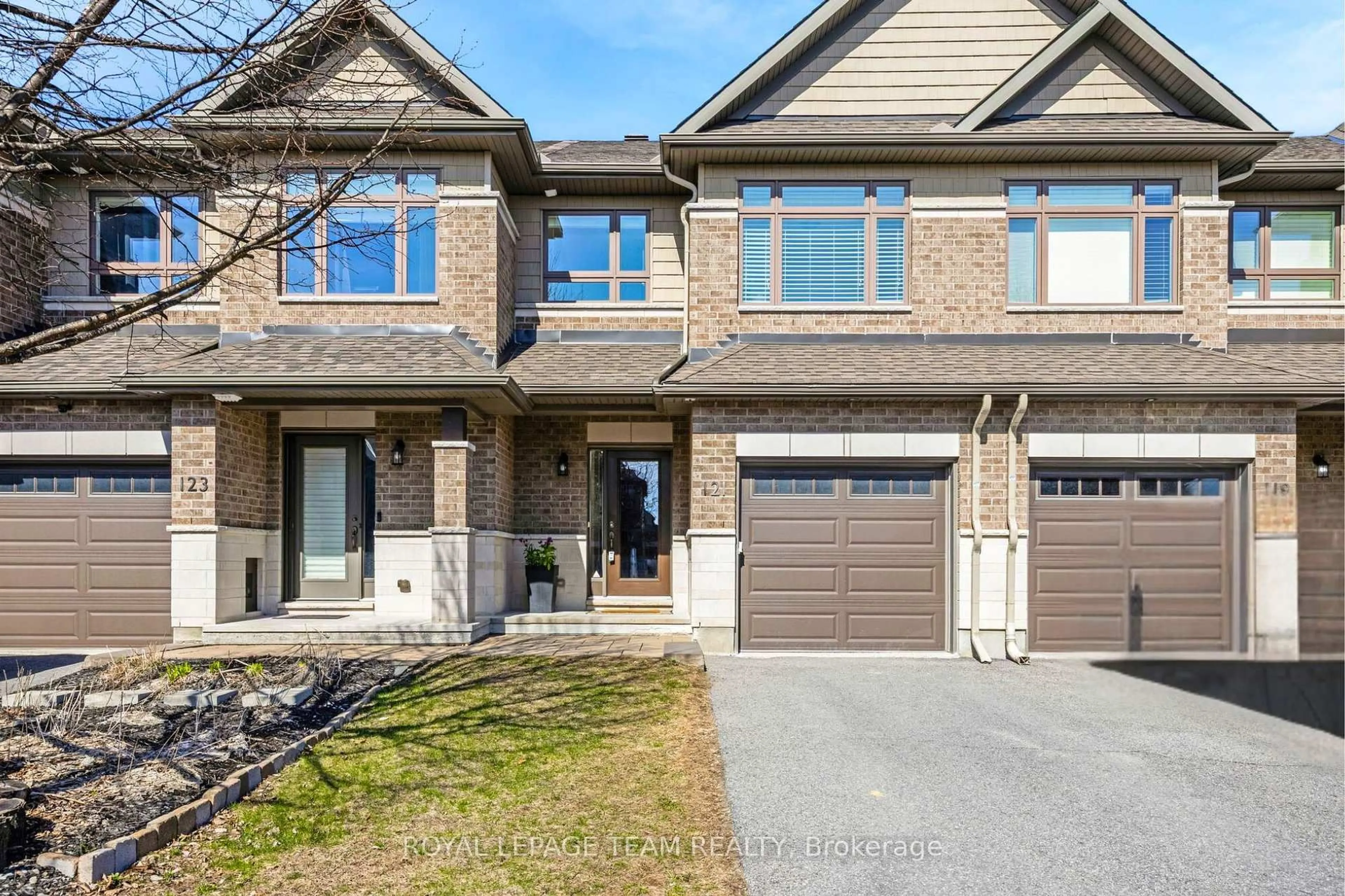 Home with brick exterior material, street for 121 Woodhurst Cres, Ottawa Ontario K2S 0T4