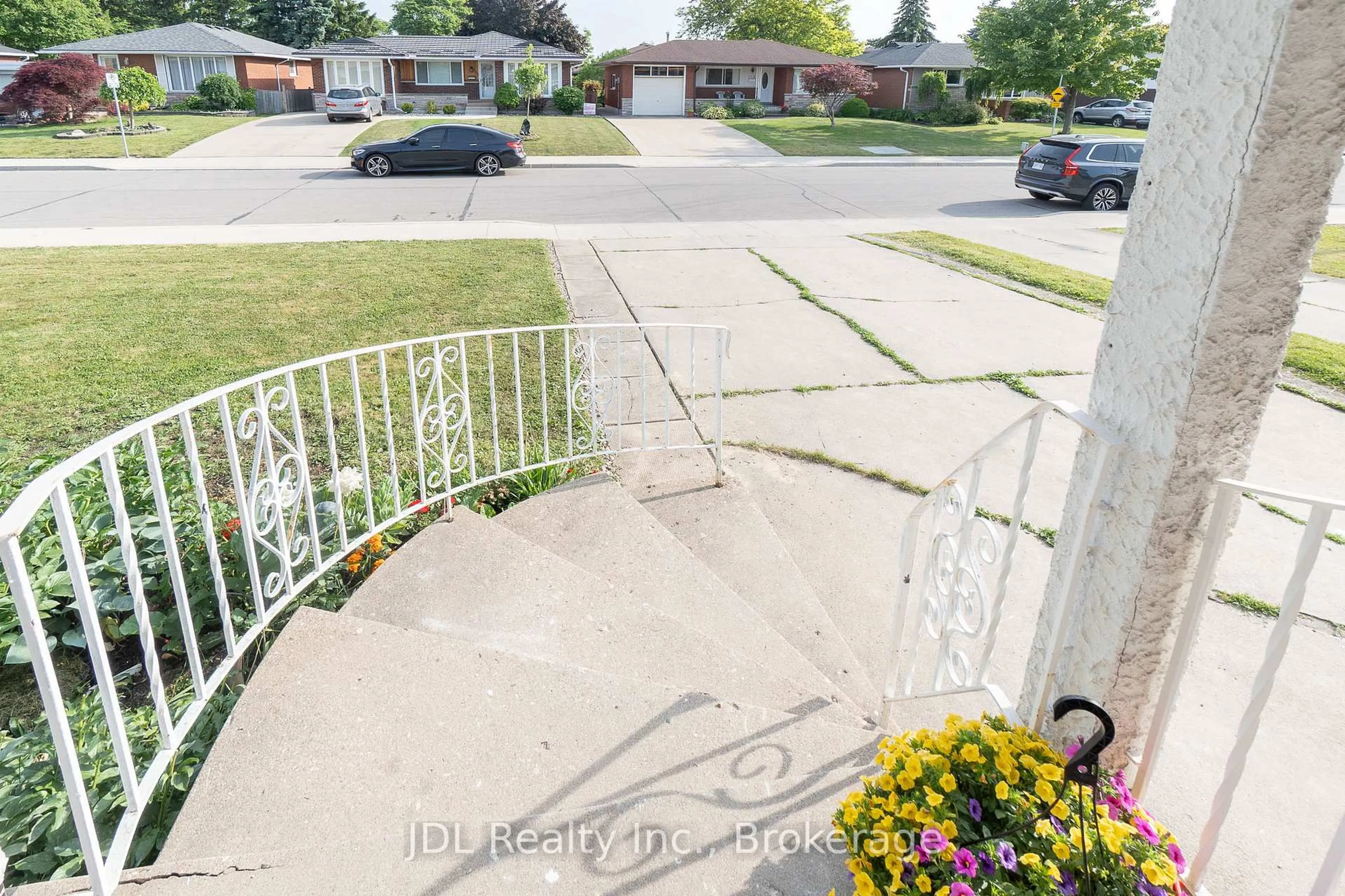 Patio, street for 121 Delmar Dr, Hamilton Ontario L9C 1J8