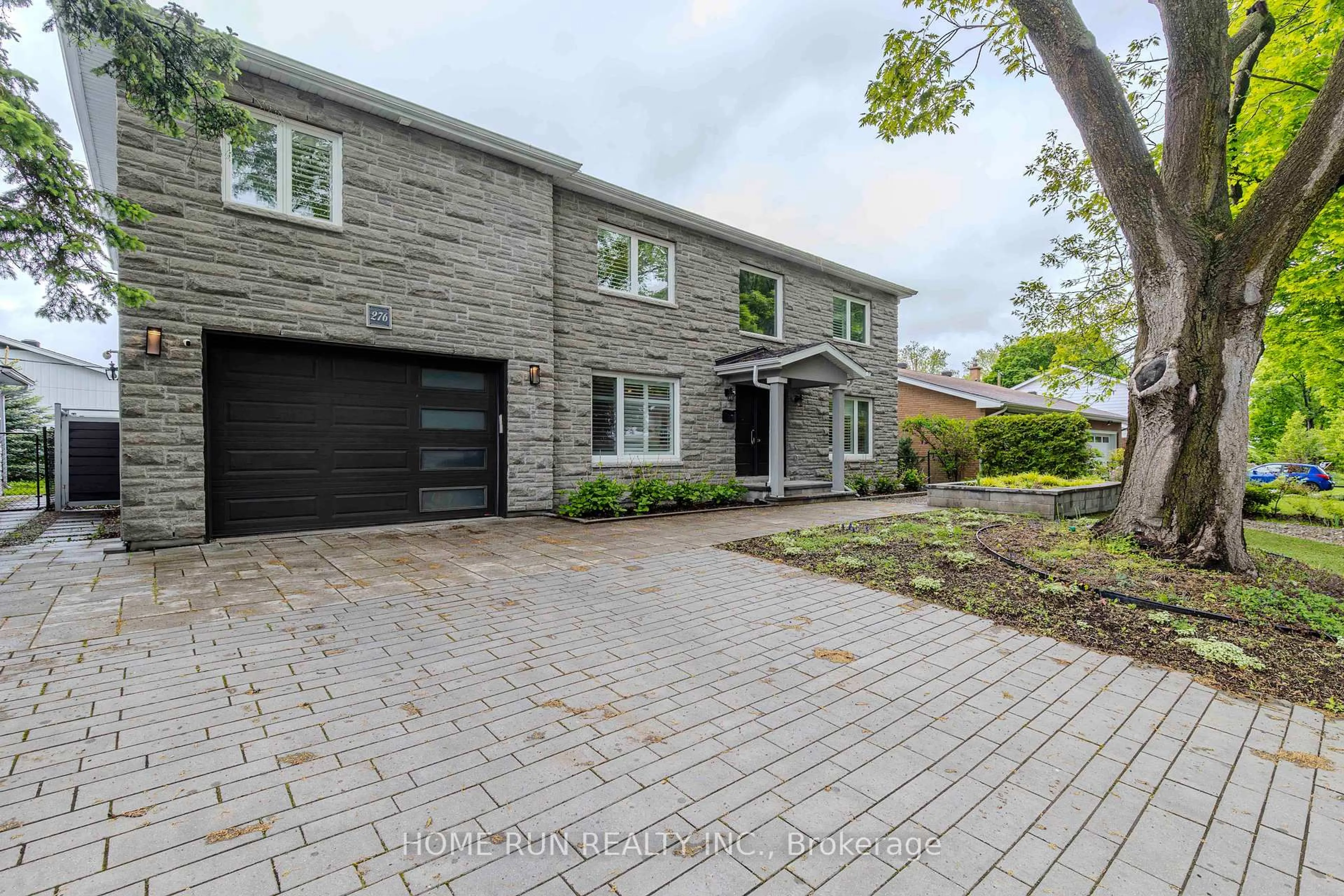 Home with brick exterior material, street for 276 Crocus Ave, Ottawa Ontario K1H 6E9