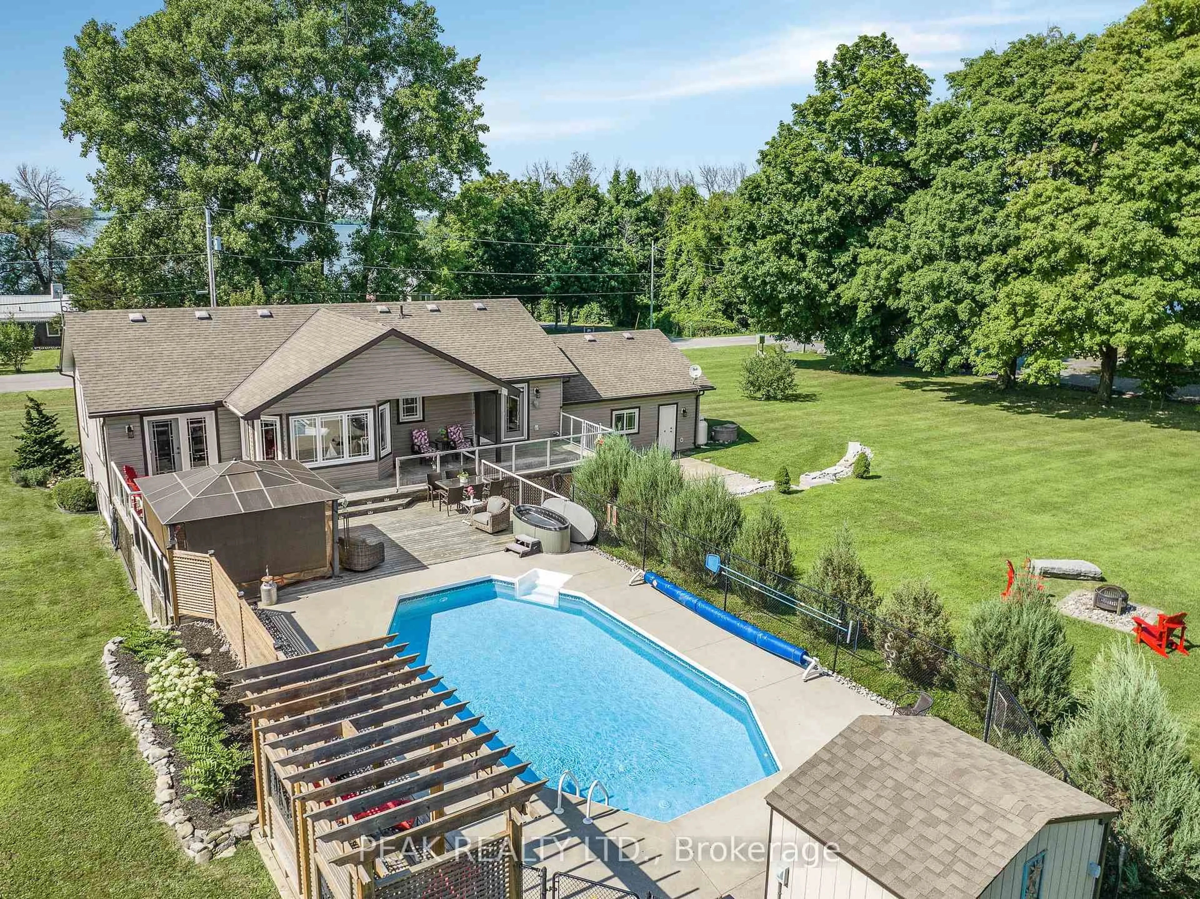 A pic from outside/outdoor area/front of a property/back of a property/a pic from drone, water/lake/river/ocean view for 116 Prinyers Cove Cres, Prince Edward County Ontario K0K 2T0