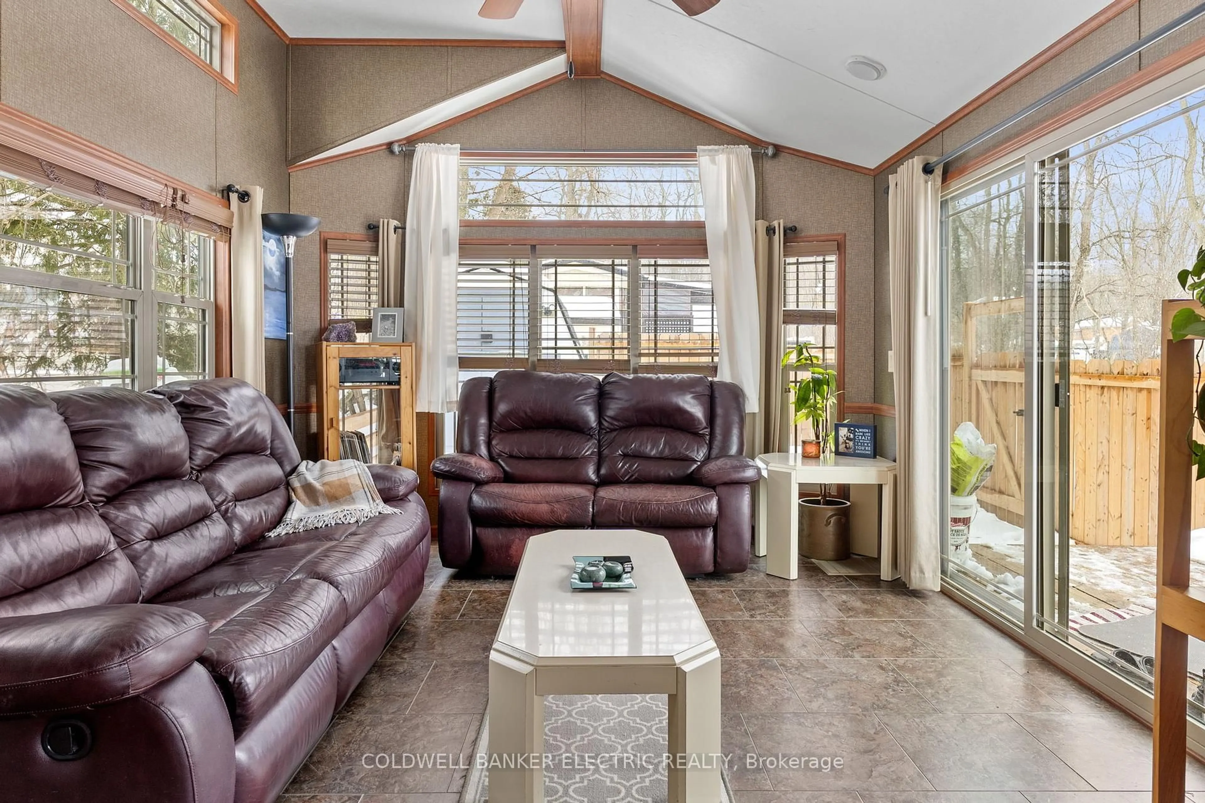 Living room with furniture, ceramic/tile floor for 5139 Halstead Beach Rd #485B, Hamilton Township Ontario K0L 1E0