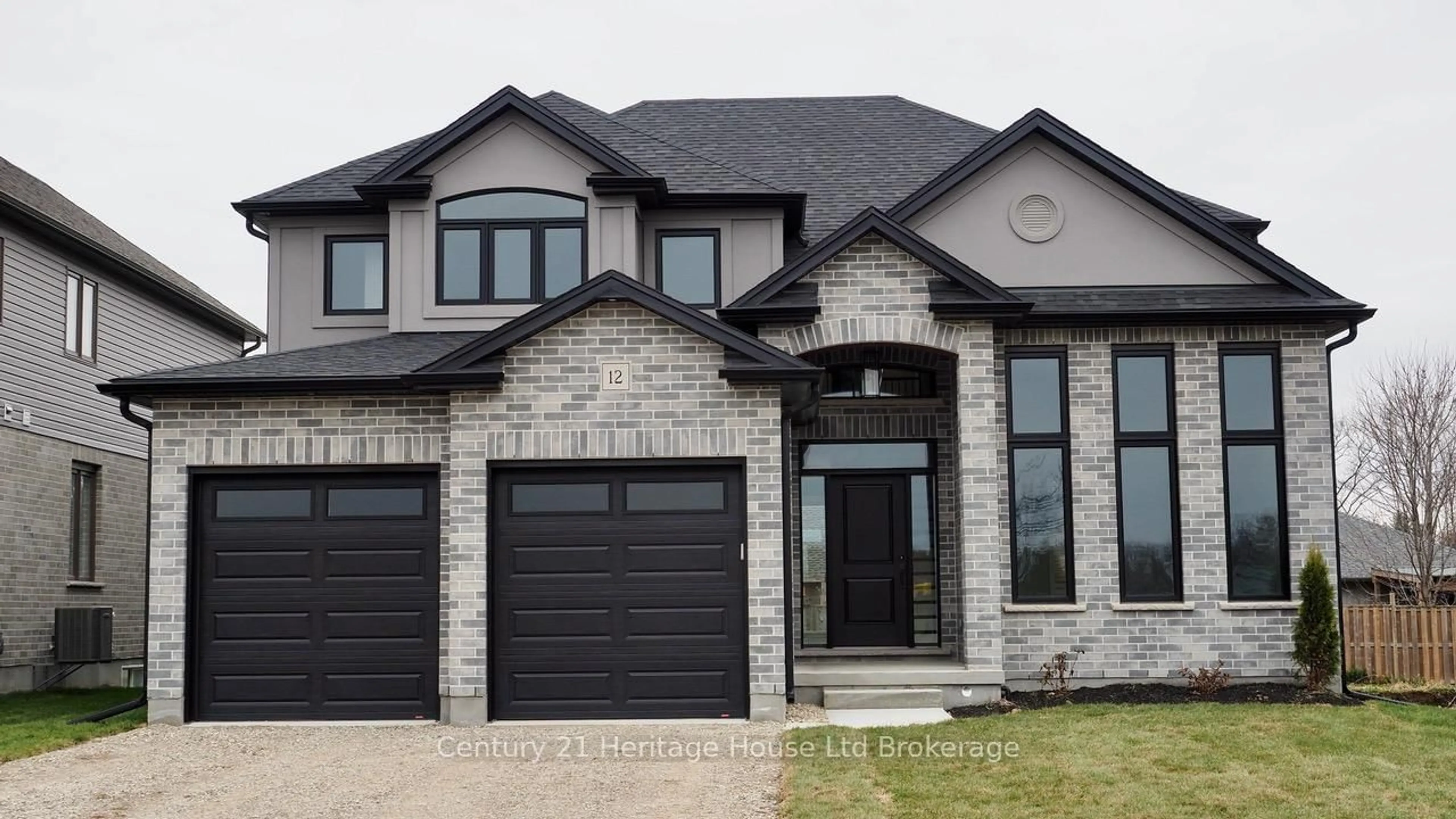 Home with brick exterior material, street for 12 SYCAMORE Dr, Tillsonburg Ontario N4G 5S3