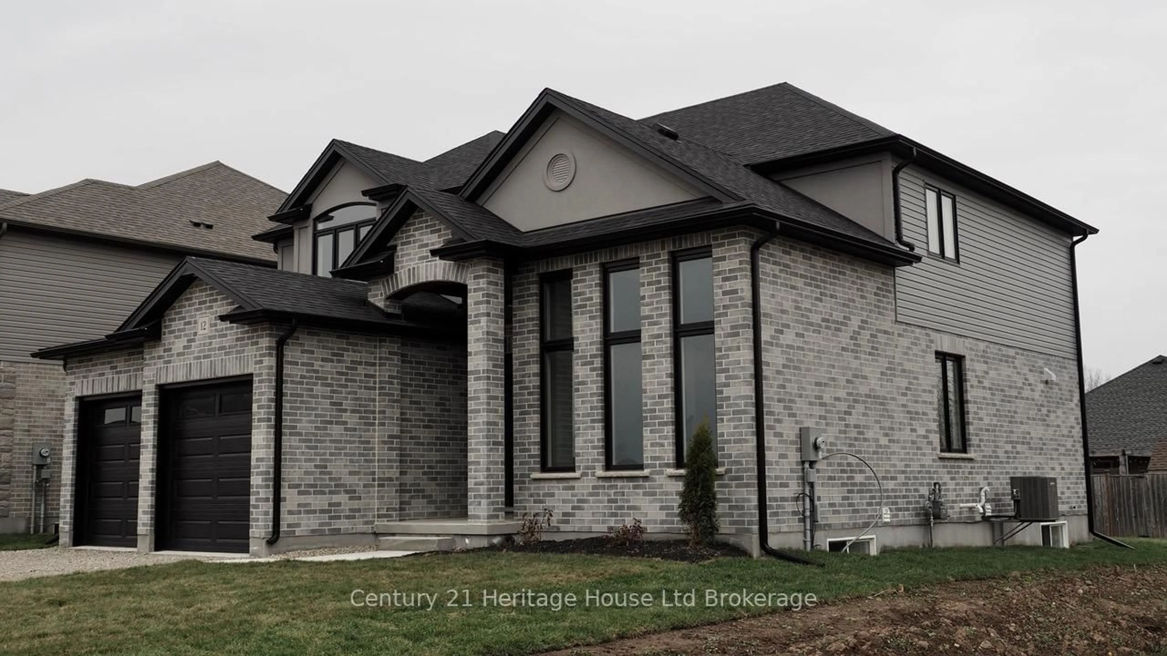 Home with brick exterior material, unknown for 12 SYCAMORE Dr, Tillsonburg Ontario N4G 5S3