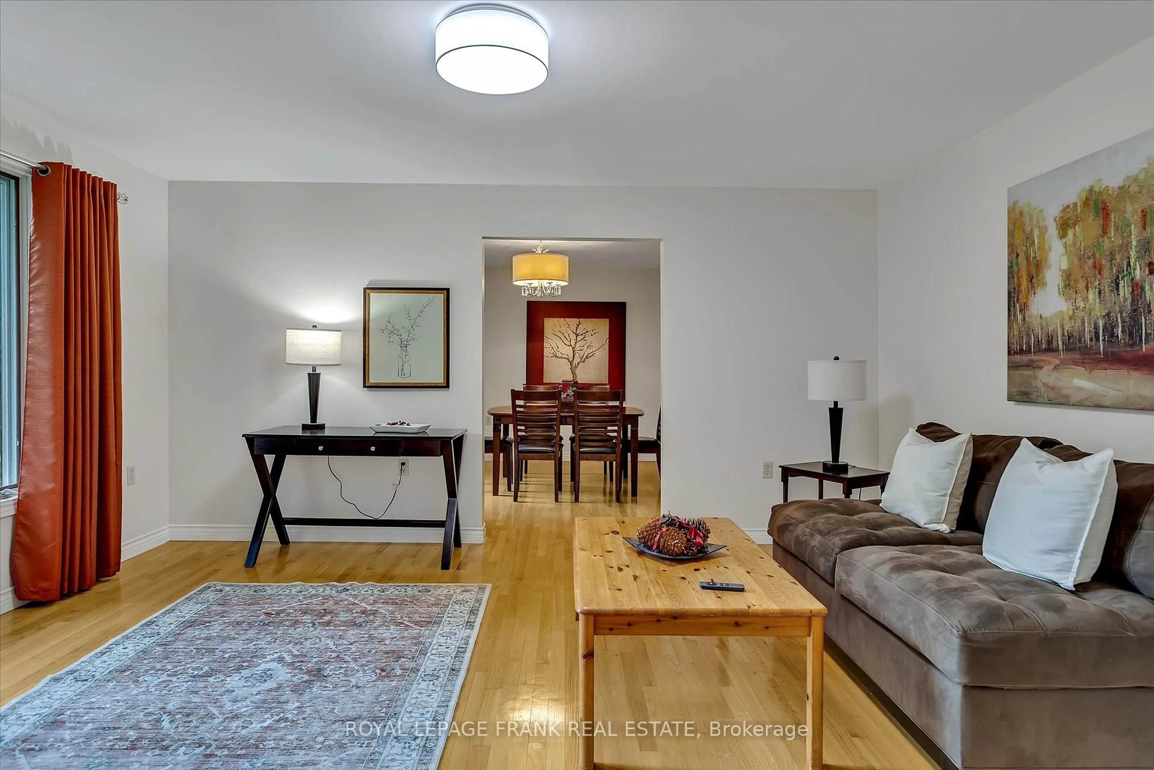 Living room with furniture, wood/laminate floor for 102 Edwina Dr, Trent Lakes Ontario K0M 1A0