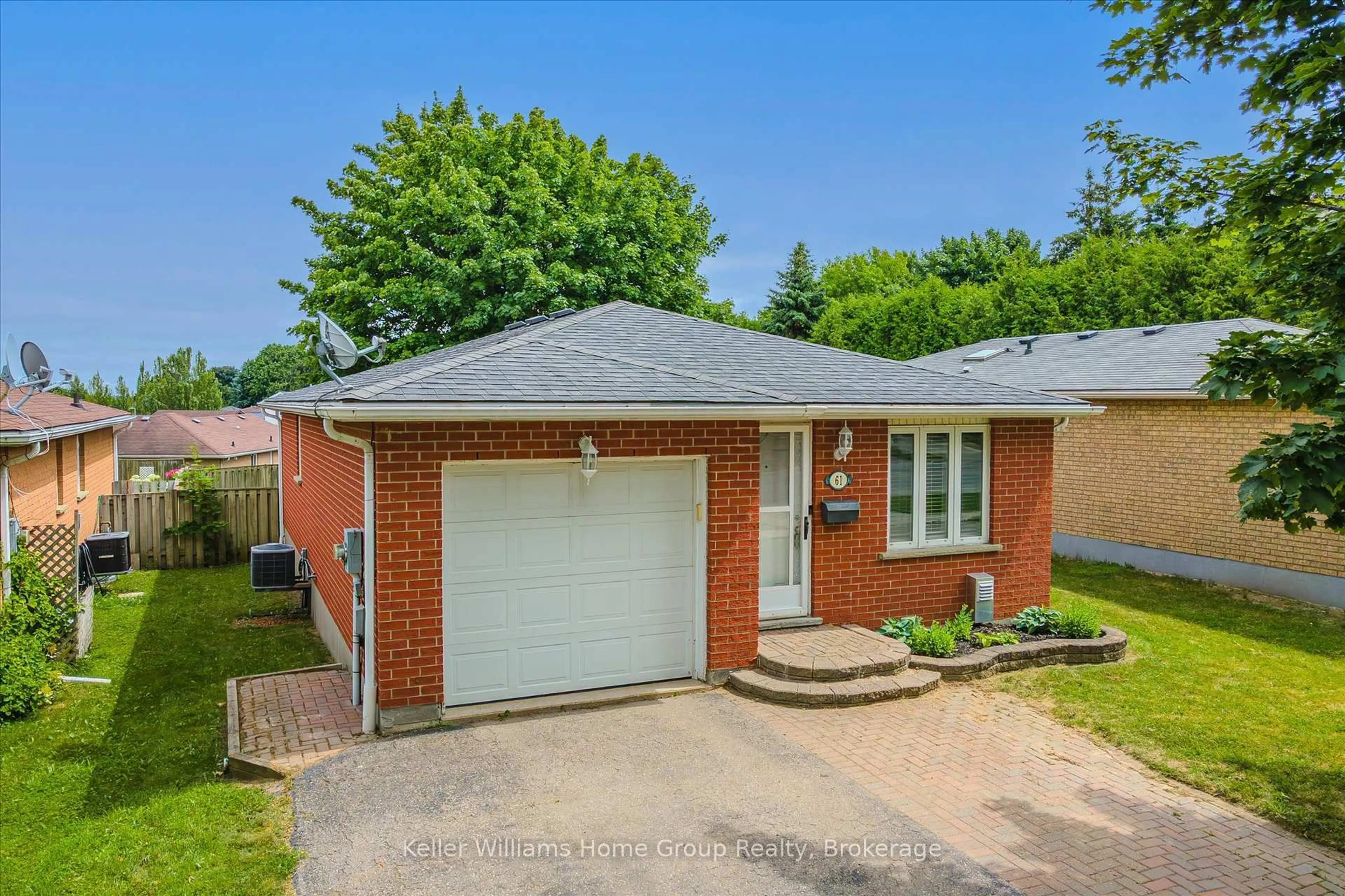 Home with brick exterior material, street for 61 Eastview Rd, Guelph Ontario N1E 6K5