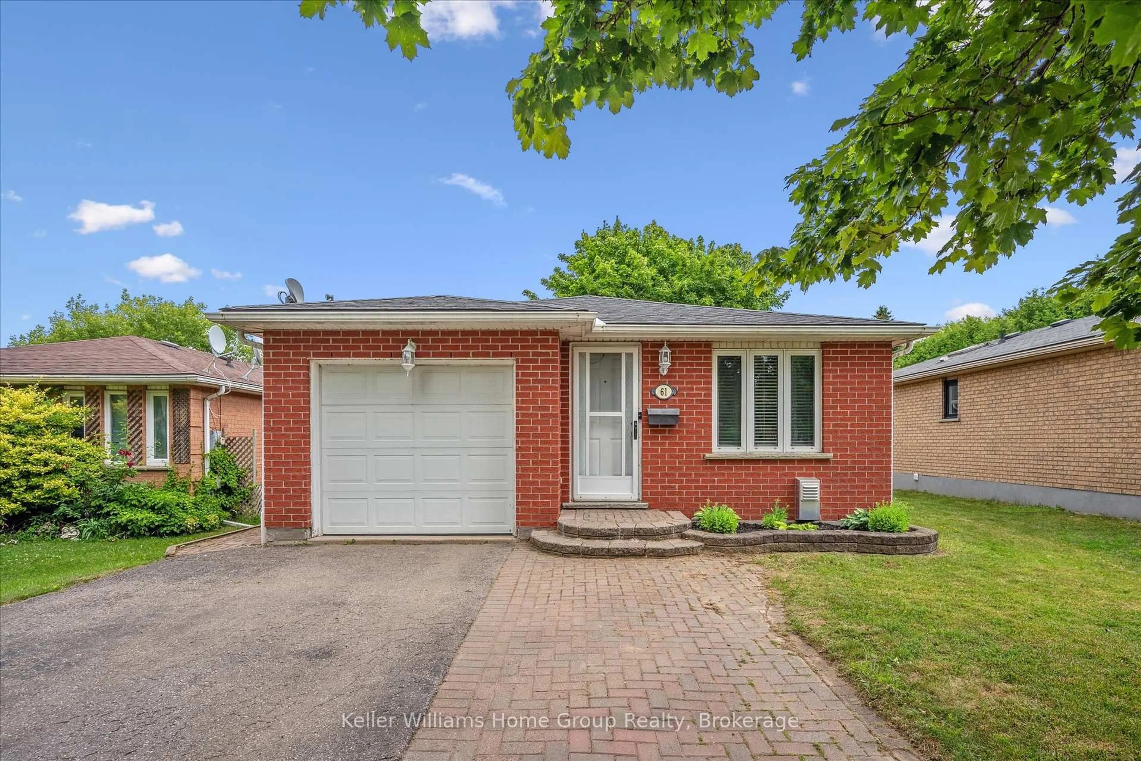 Home with brick exterior material, street for 61 Eastview Rd, Guelph Ontario N1E 6K5