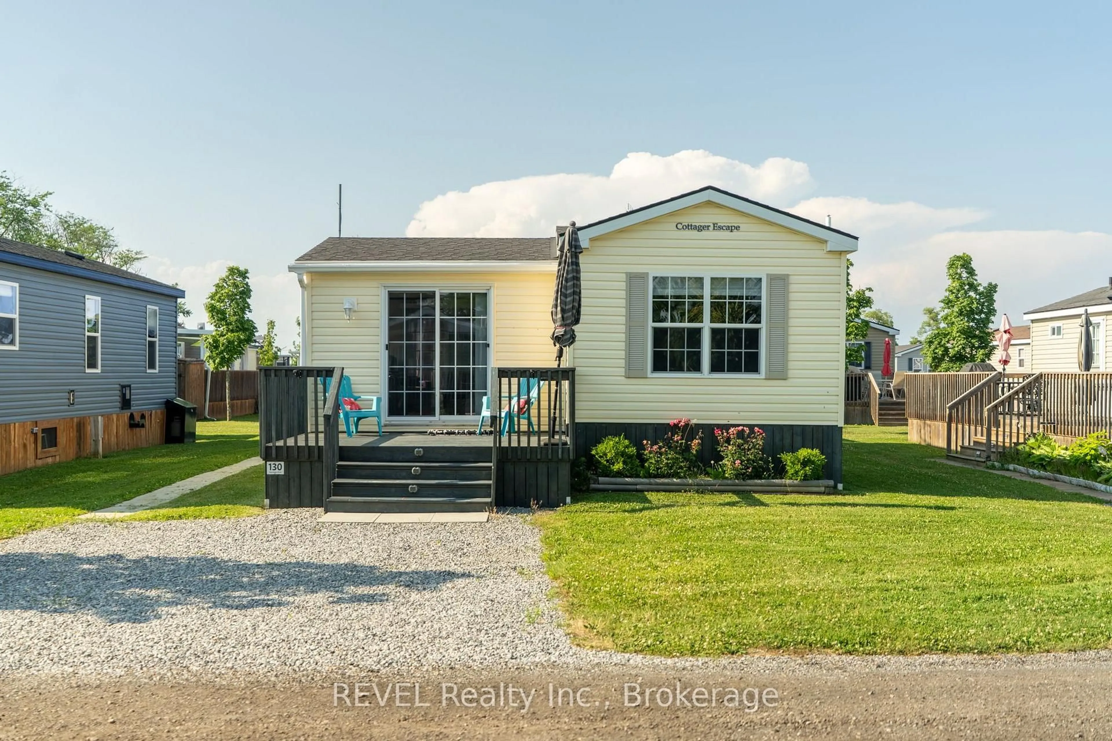 Home with vinyl exterior material, street for 1501 Line 8 Rd #130, Niagara-on-the-Lake Ontario L0S 1J0