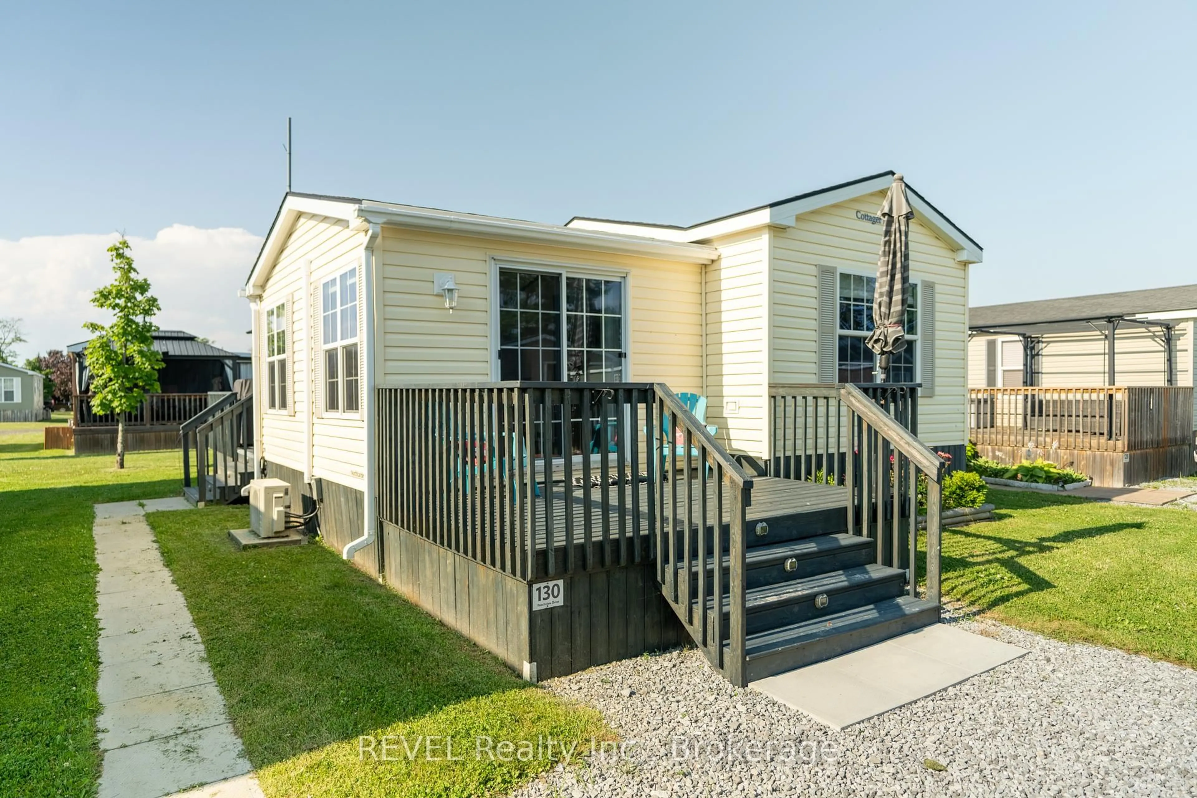 Home with vinyl exterior material, street for 1501 Line 8 Rd #130, Niagara-on-the-Lake Ontario L0S 1J0