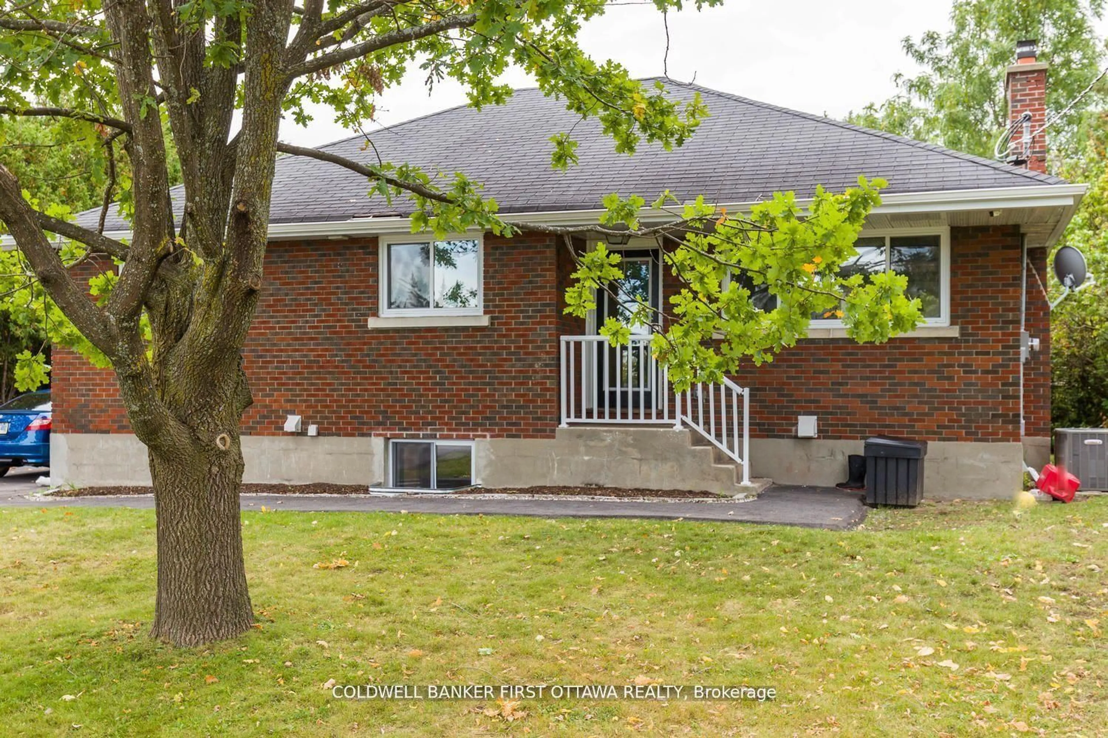 Home with brick exterior material, street for 34 WESTWOOD Dr, Ottawa Ontario K2G 2X1
