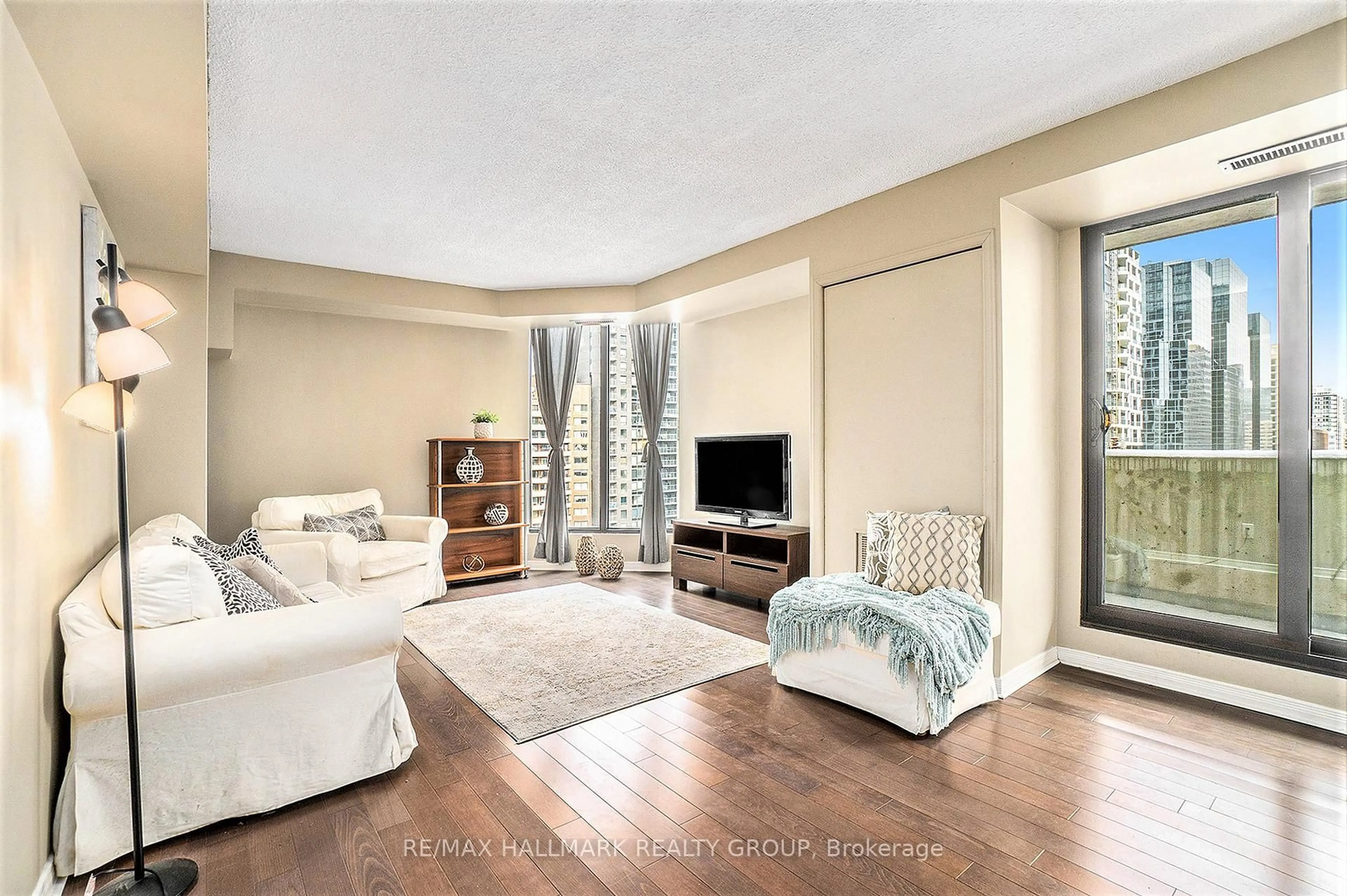 Living room with furniture, unknown for 200 Bay St #1102, Ottawa Ontario K1R 7W8