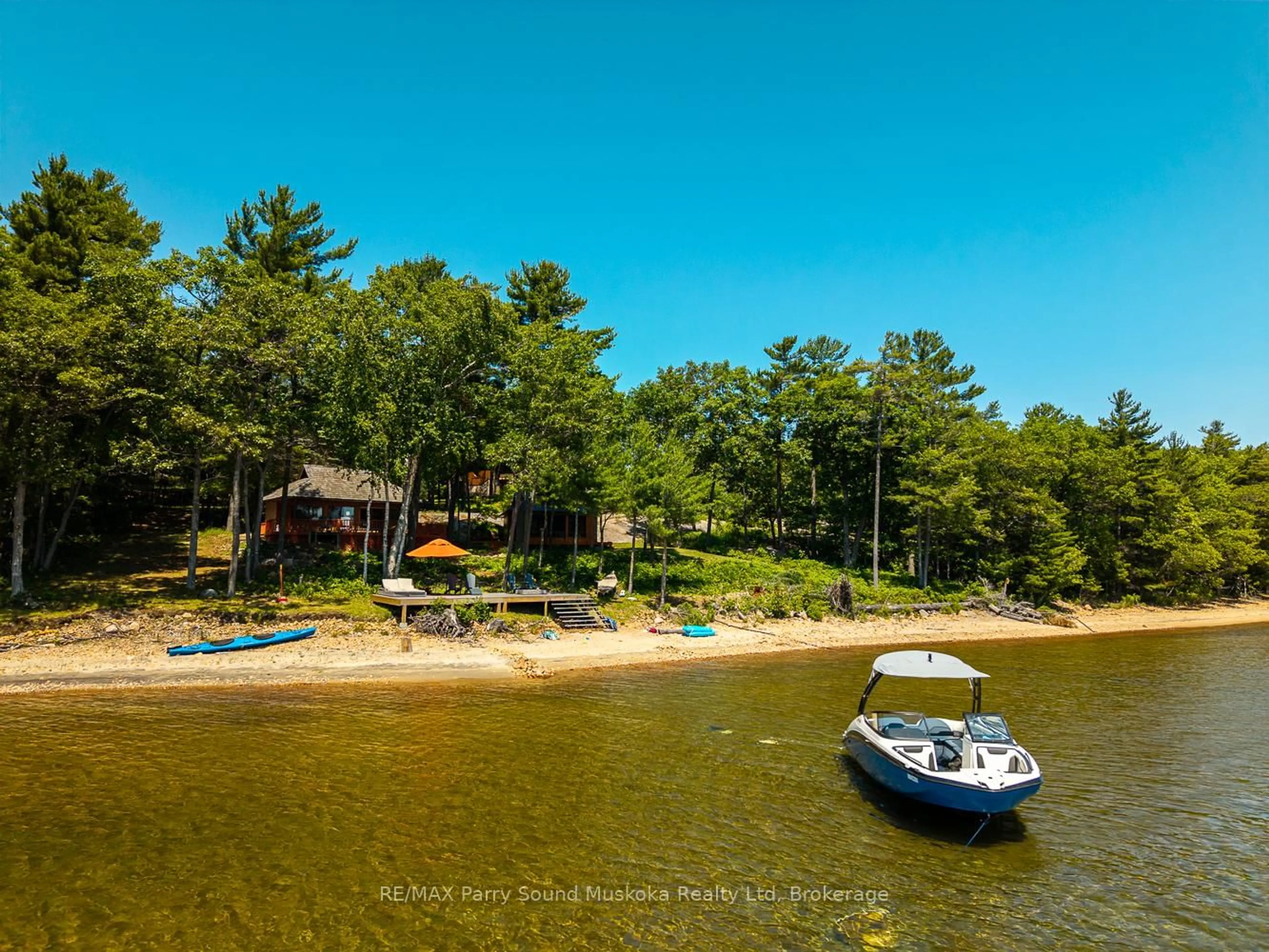 A pic from outside/outdoor area/front of a property/back of a property/a pic from drone, water/lake/river/ocean view for 47 Linda Lane, Carling Ontario P0G 1G0