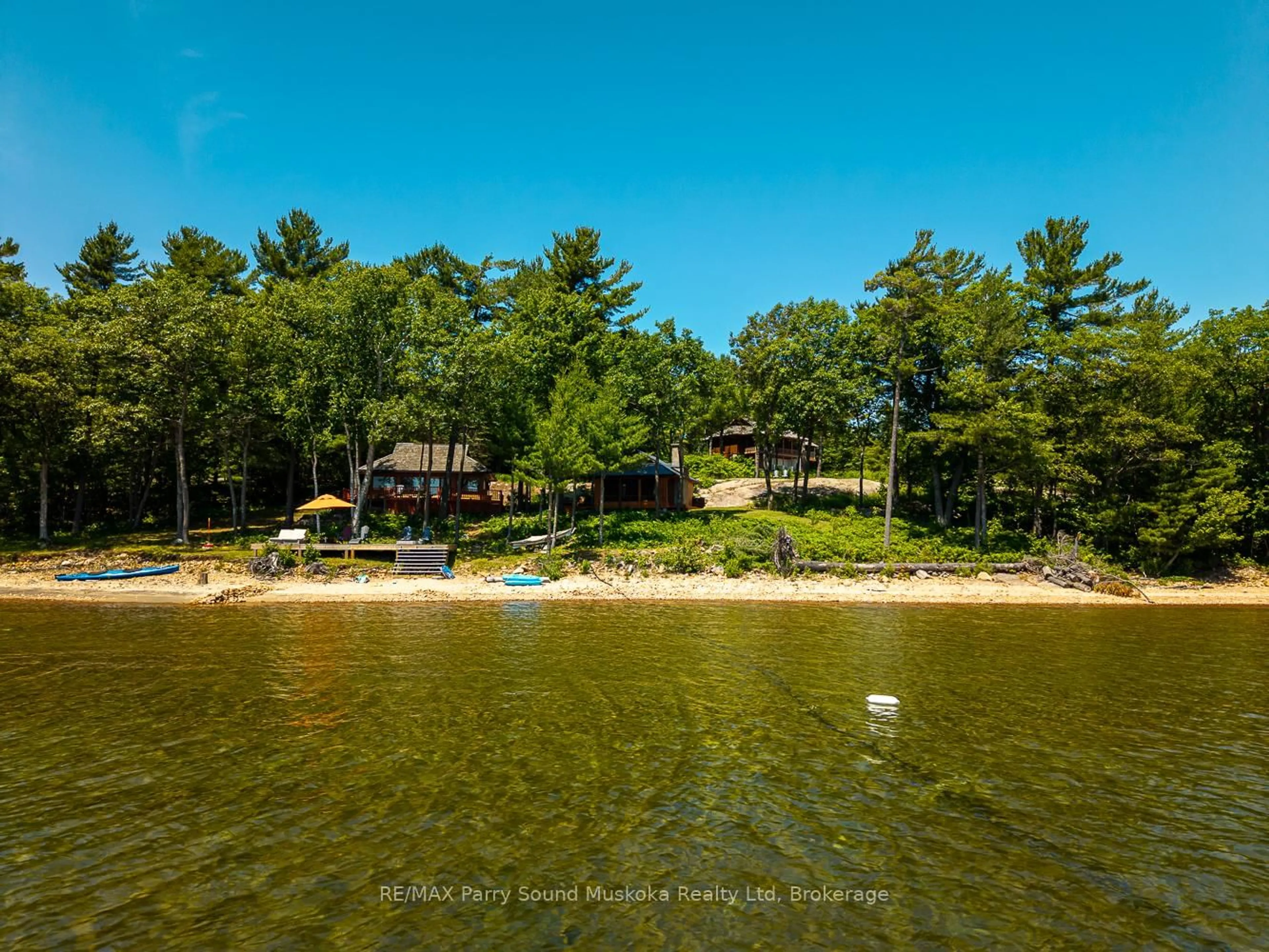 A pic from outside/outdoor area/front of a property/back of a property/a pic from drone, water/lake/river/ocean view for 47 Linda Lane, Carling Ontario P0G 1G0