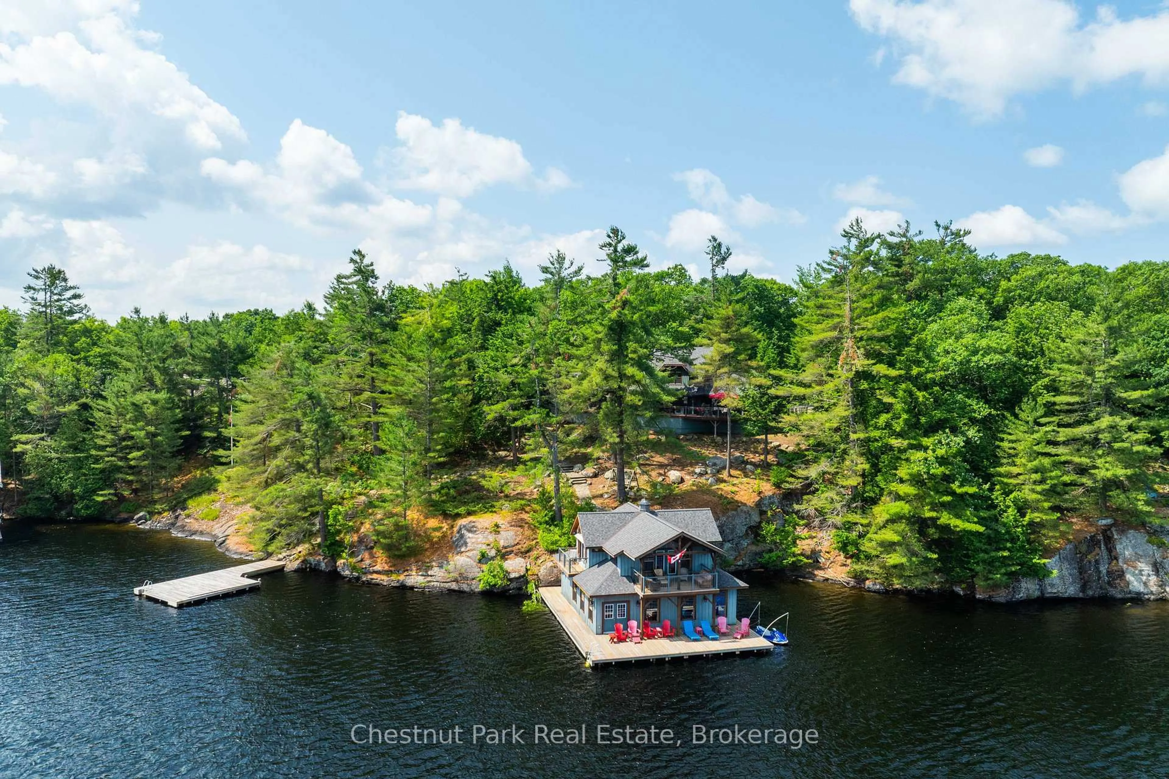 A pic from outside/outdoor area/front of a property/back of a property/a pic from drone, water/lake/river/ocean view for 1341 Innisfree Rd, Muskoka Lakes Ontario P0B 1J0