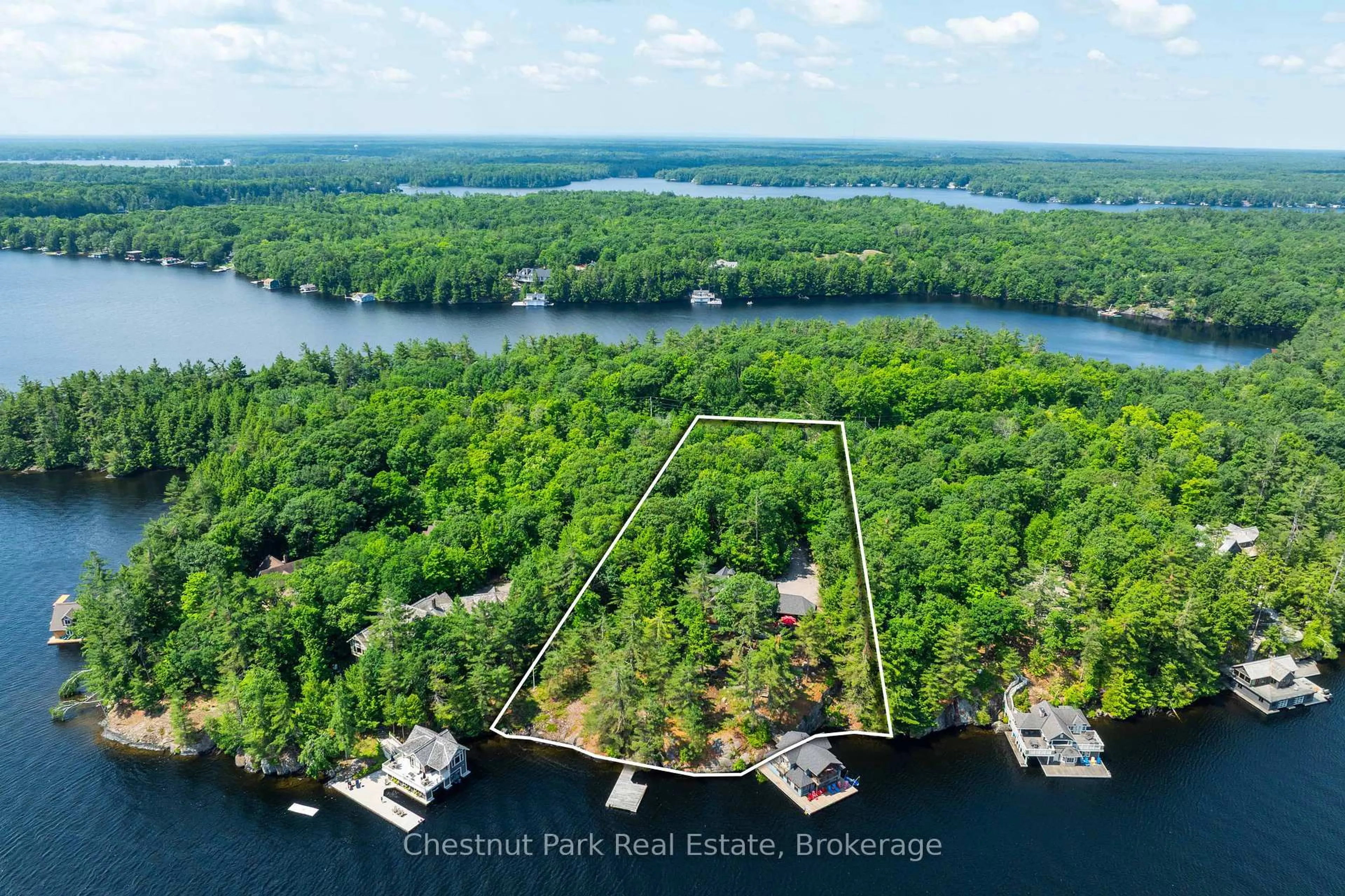 A pic from outside/outdoor area/front of a property/back of a property/a pic from drone, water/lake/river/ocean view for 1341 Innisfree Rd, Muskoka Lakes Ontario P0B 1J0