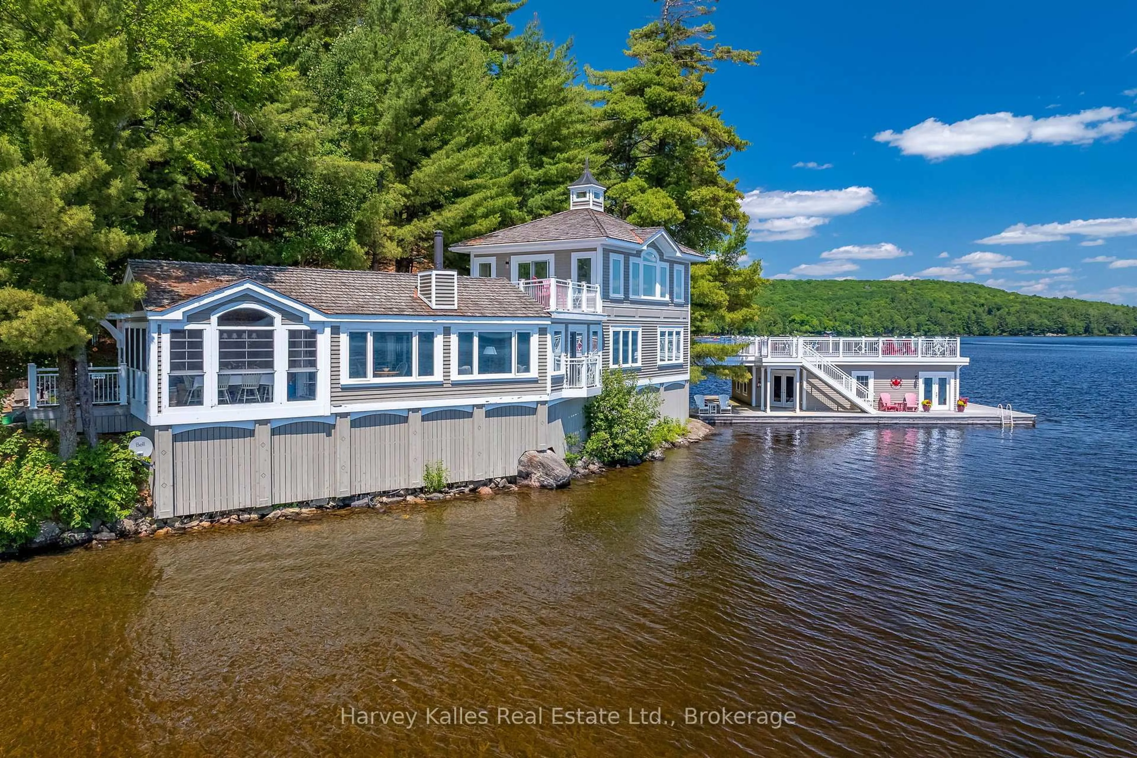 A pic from outside/outdoor area/front of a property/back of a property/a pic from drone, water/lake/river/ocean view for 3661 South Portage Rd, Huntsville Ontario P1H 2J3
