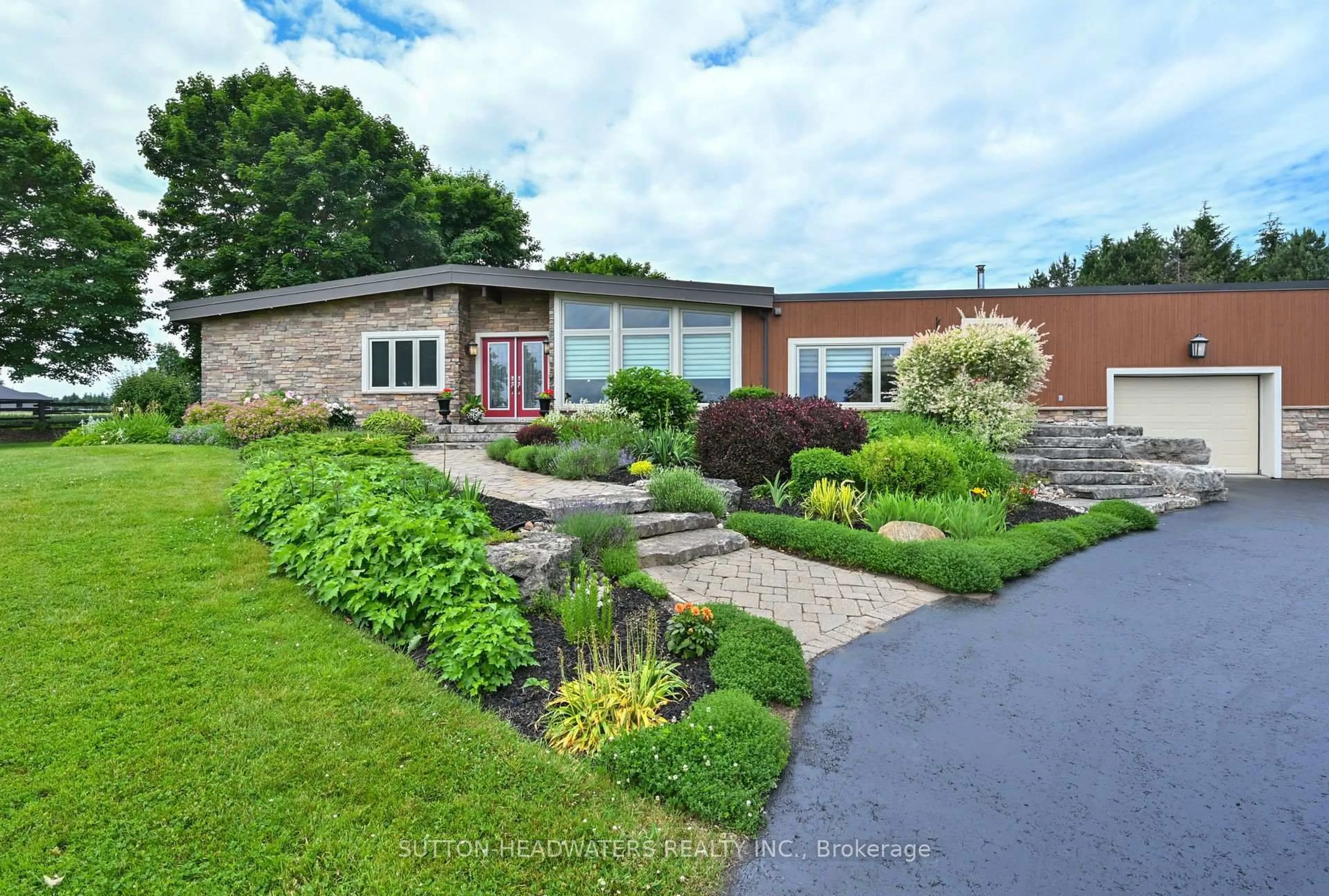 A pic from outside/outdoor area/front of a property/back of a property/a pic from drone, street for 064349 County Rd 3, East Garafraxa Ontario L9W 7J5