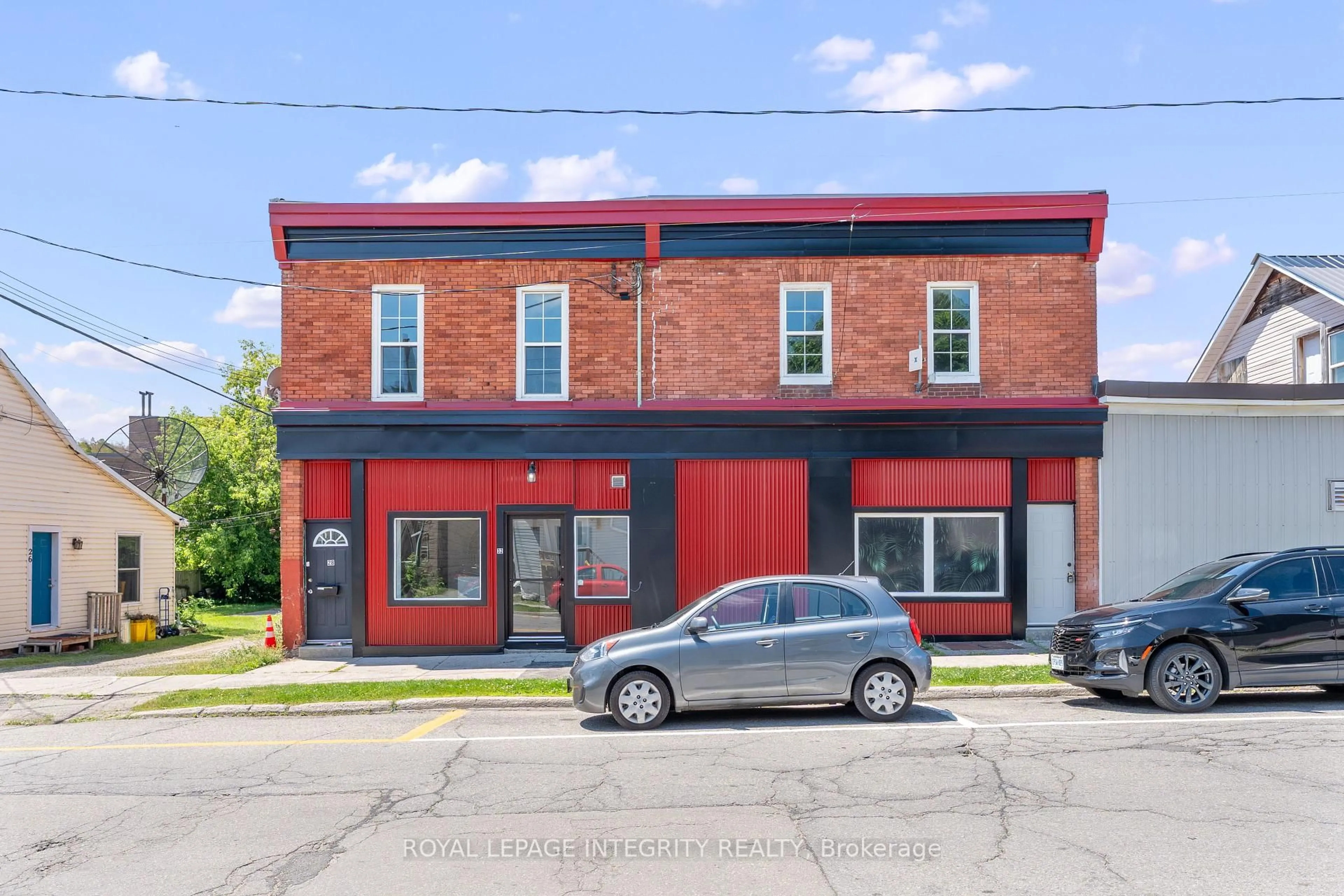 Home with brick exterior material, street for 28-34 Market St, Smiths Falls Ontario K7A 2E6