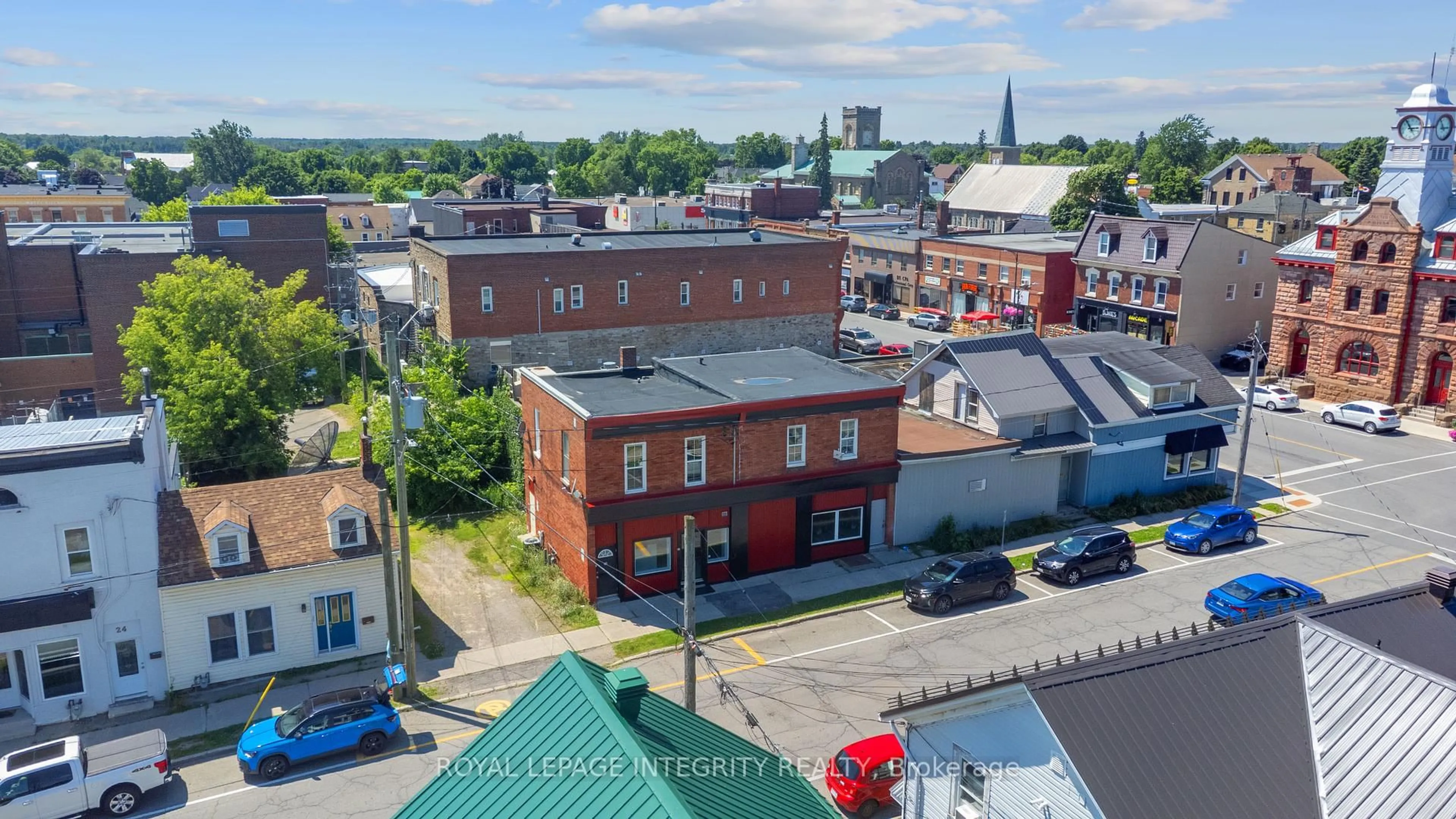 A pic from outside/outdoor area/front of a property/back of a property/a pic from drone, city buildings view from balcony for 28-34 Market St, Smiths Falls Ontario K7A 2E6