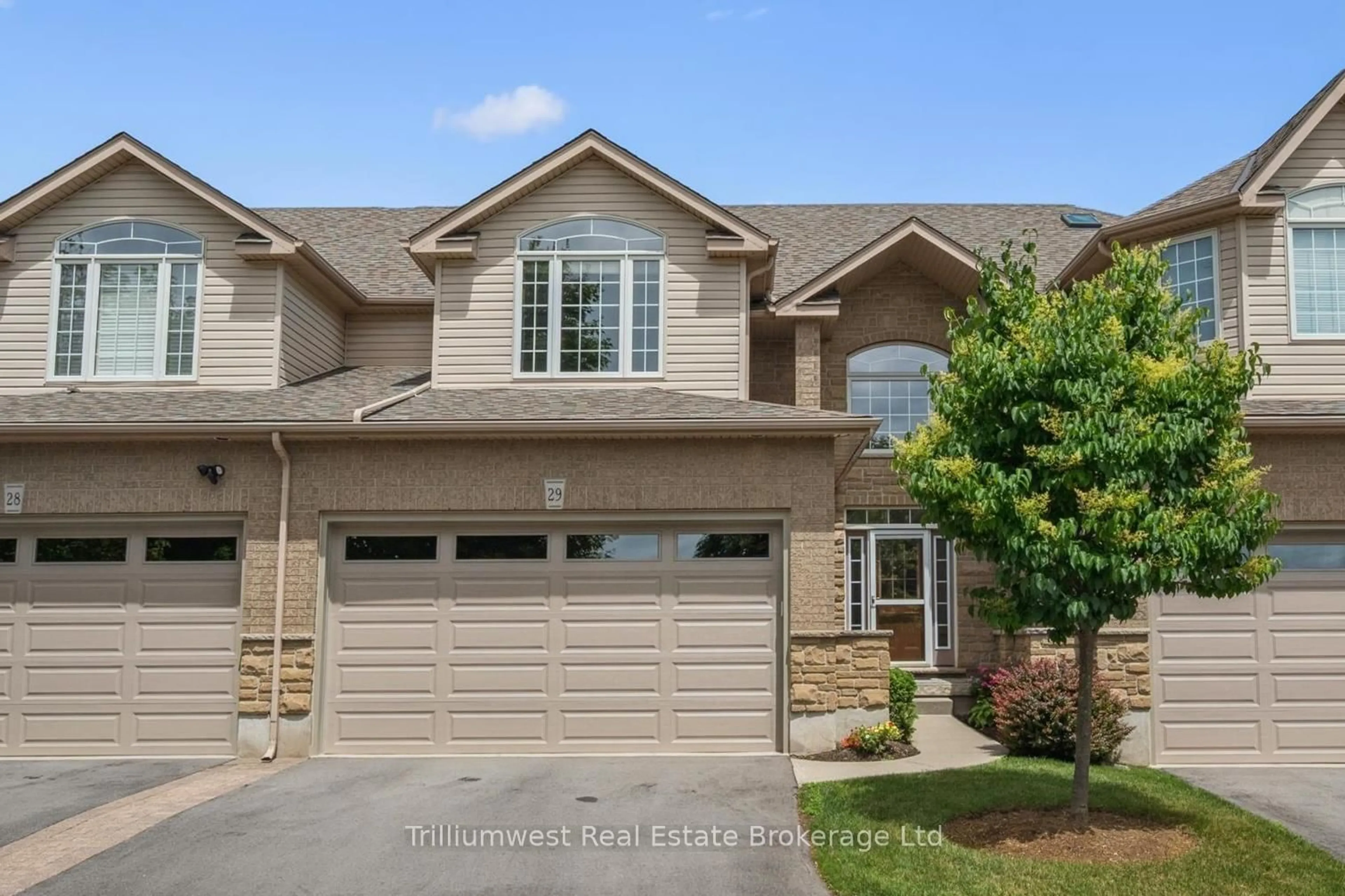 Home with brick exterior material, street for 254 Summerfield Dr #29, Guelph Ontario N1L 1R4
